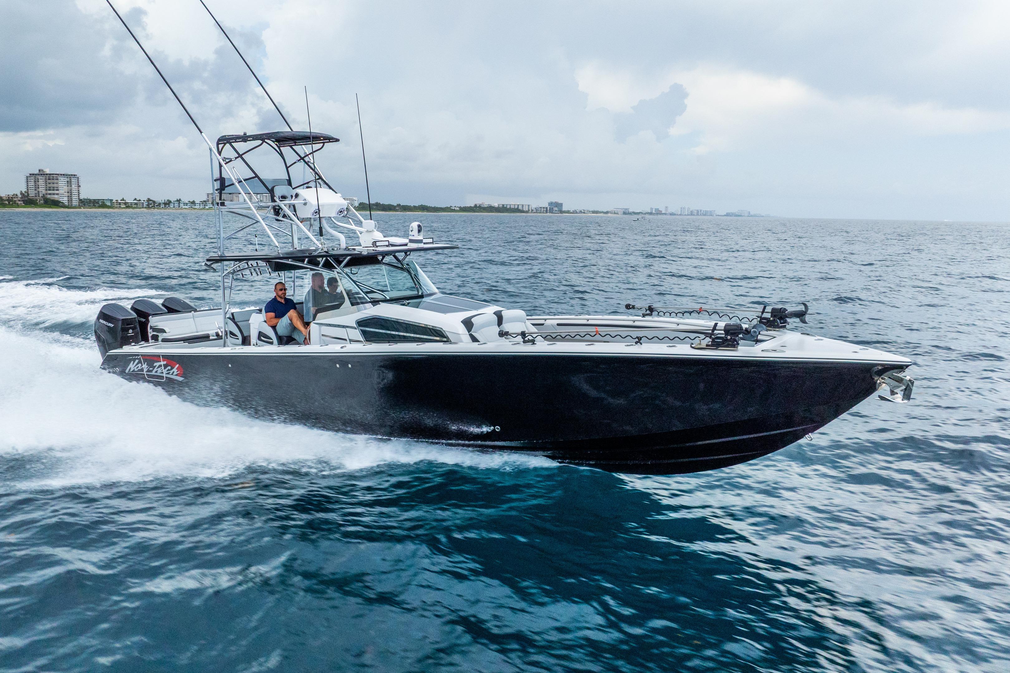 2024 Nor-Tech 452 Super Fish cruising on open water under cloudy skies.