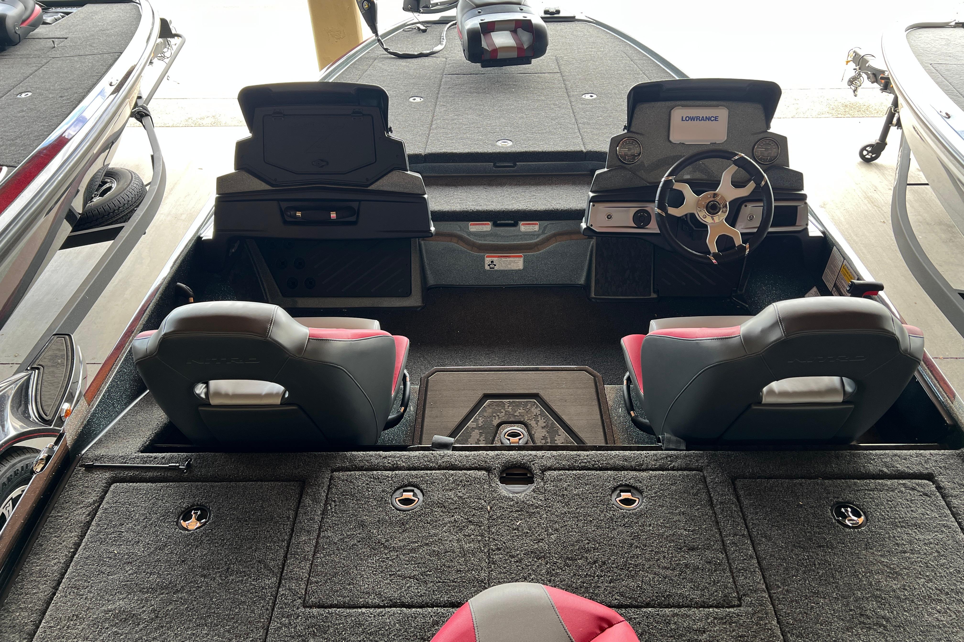 Interior of 2026 Nitro Z20 XL boat with dual seats and steering console.
