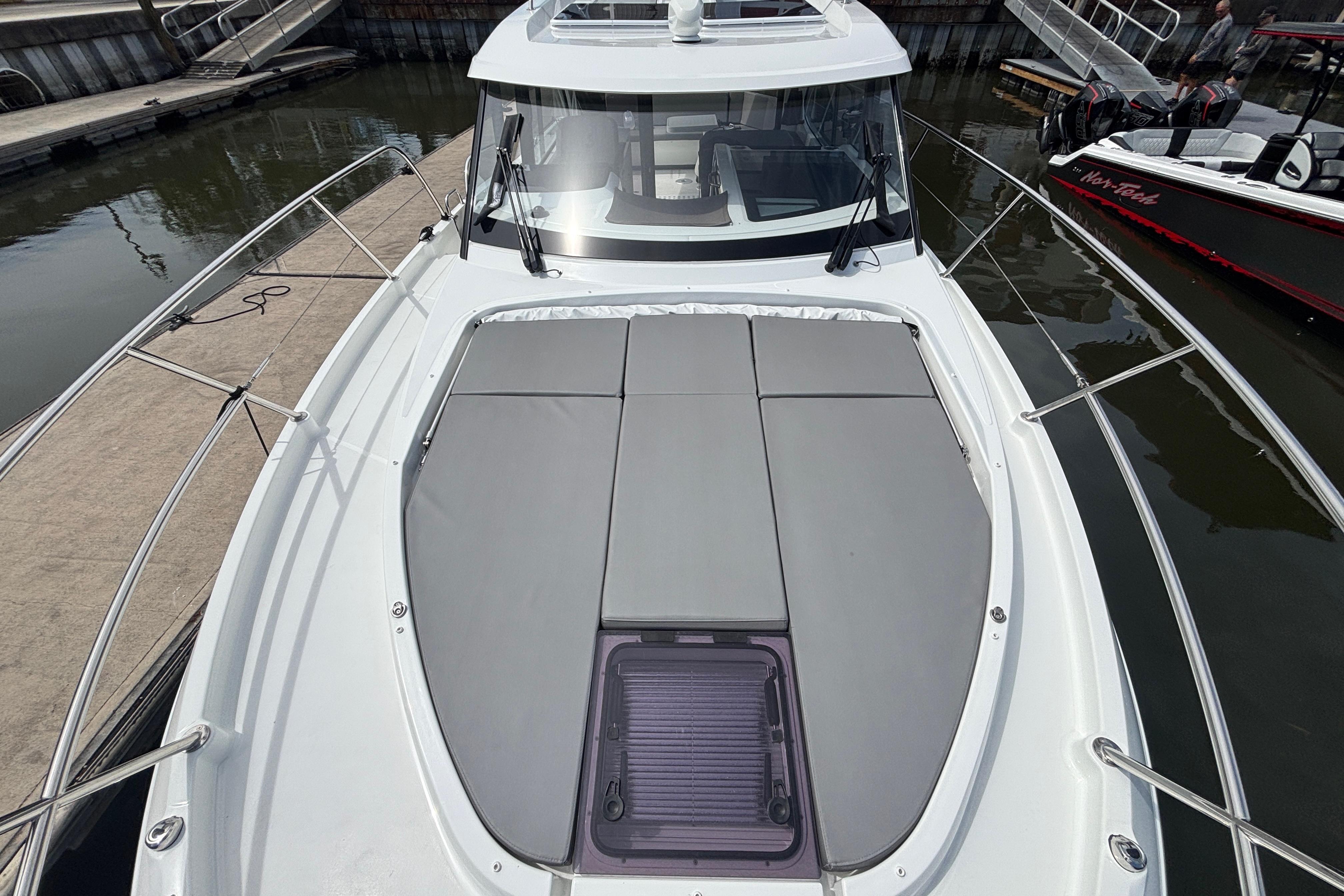 2024 Beneteau Antares 11 boat with spacious deck and sleek design at marina.