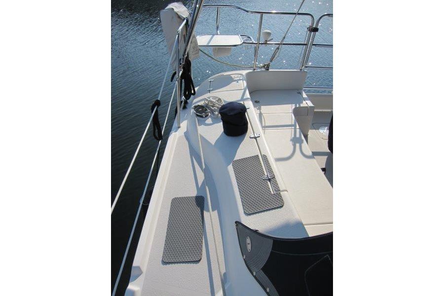 2004 Catalina 350 MkII sailboat deck with railing and water view.