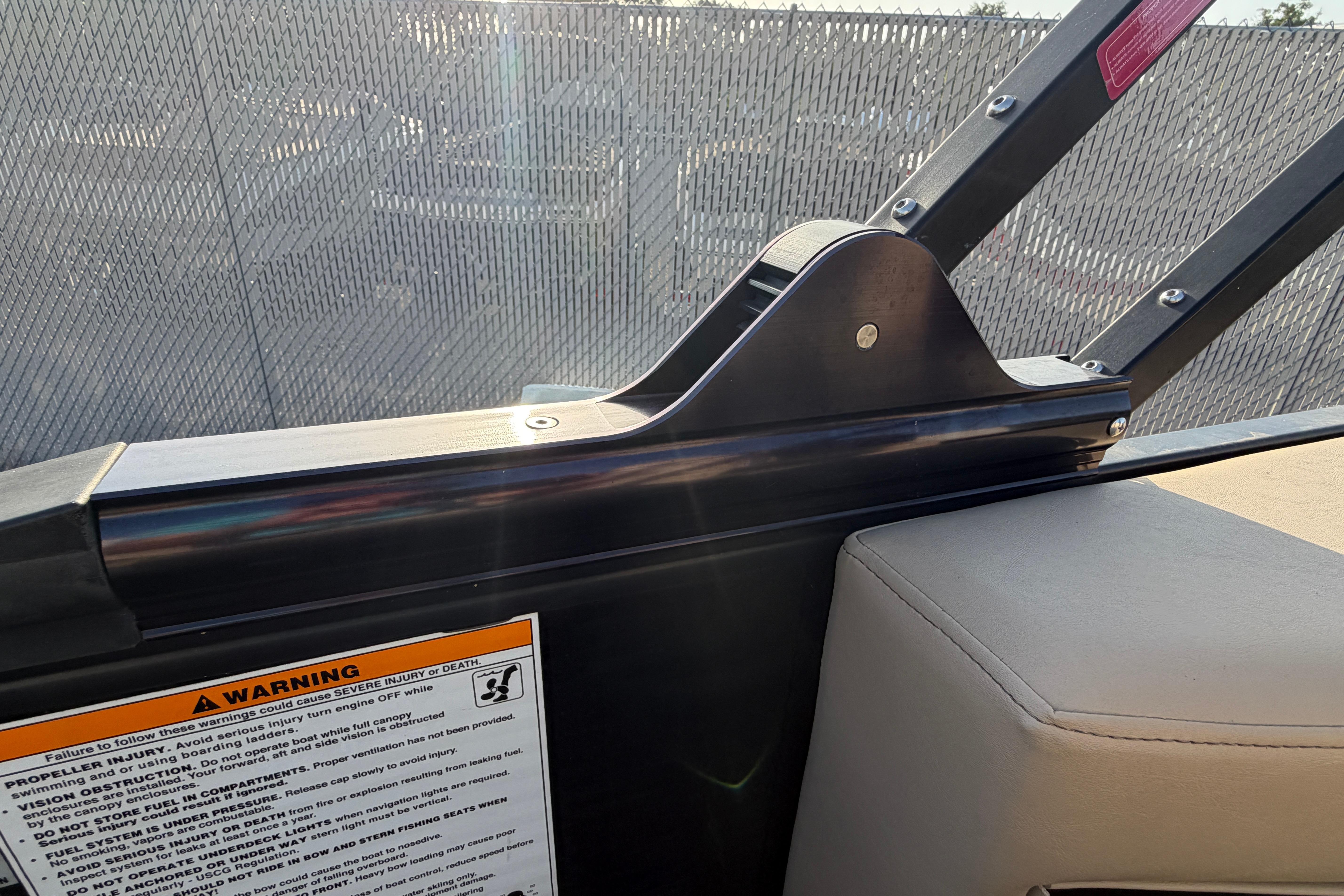 2023 Godfrey Sweetwater 2286 C boat interior detail with safety warning label.