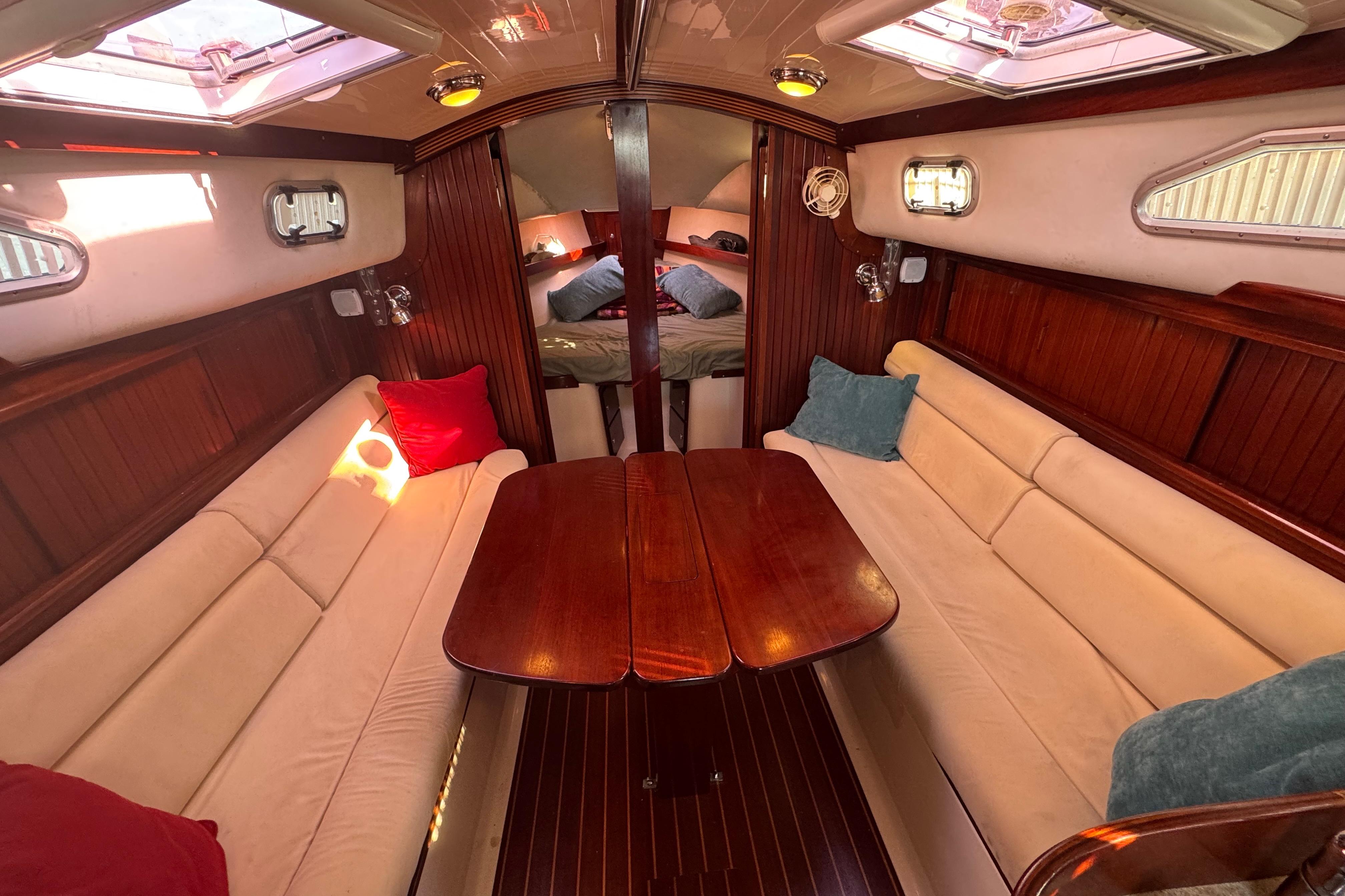 Luxurious 2006 Shannon Shoalsailer interior with elegant wood finish and cozy seating.