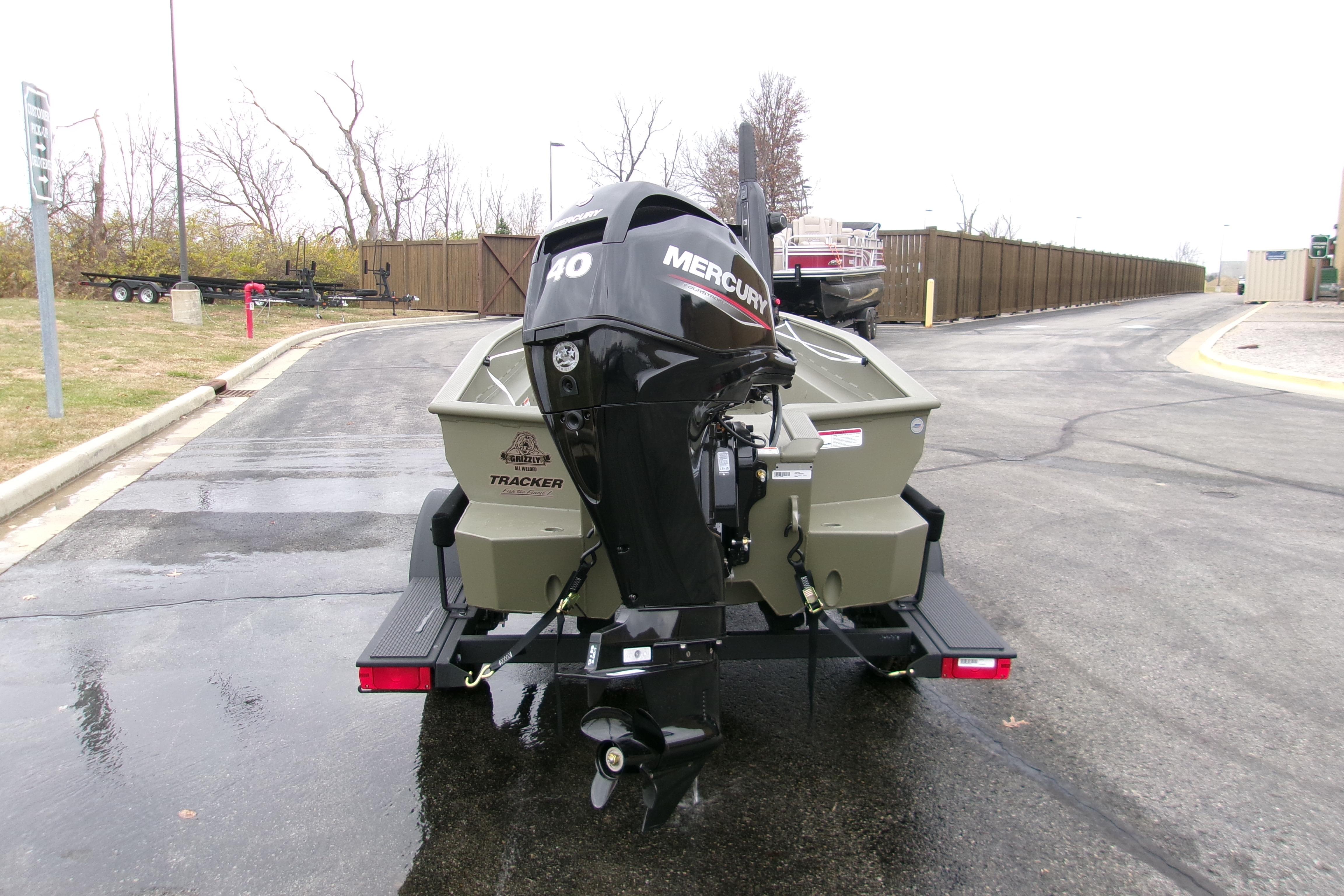 2026 Tracker Grizzly 1650 T Prairie Wings Edition boat with Mercury engine on trailer.
