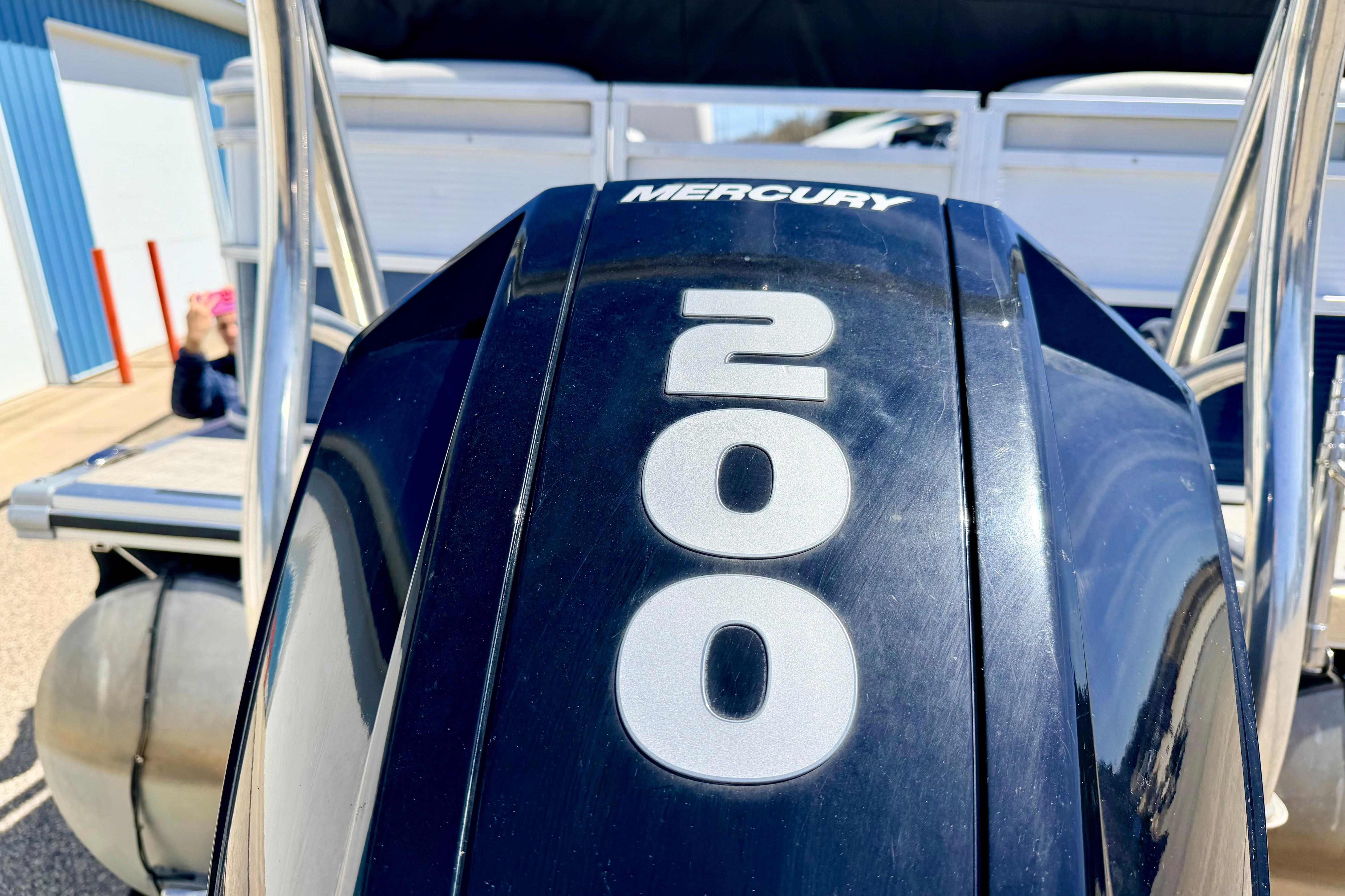 Mercury 200 engine on 2019 Crestliner 240 Rally DX CW boat, close-up view.