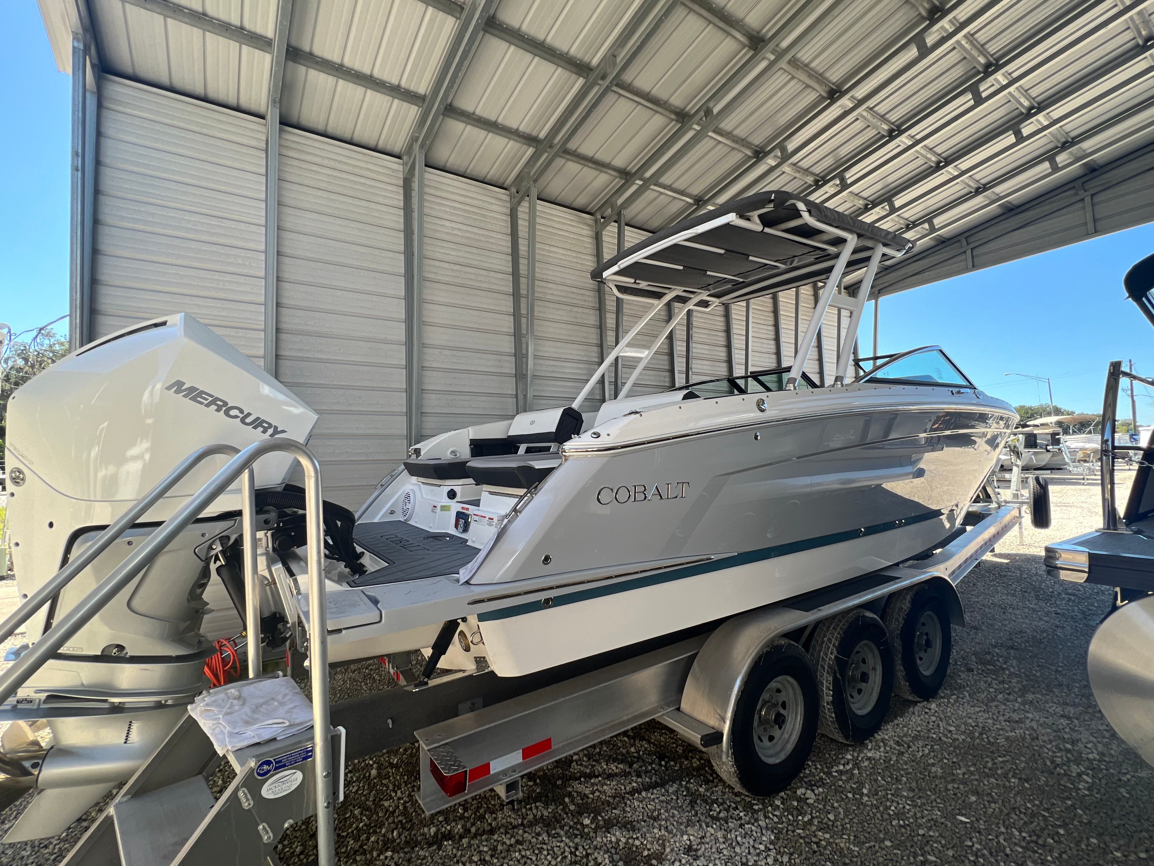 2022 Cobalt R8 Outboard boat under covered storage.