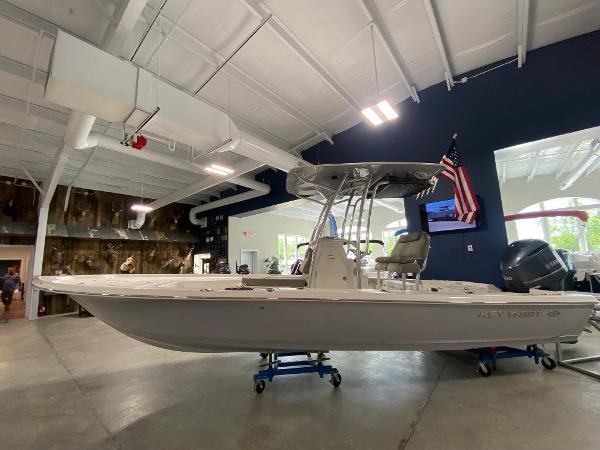 2024 Key West 250 Bay Reef boat displayed indoors.