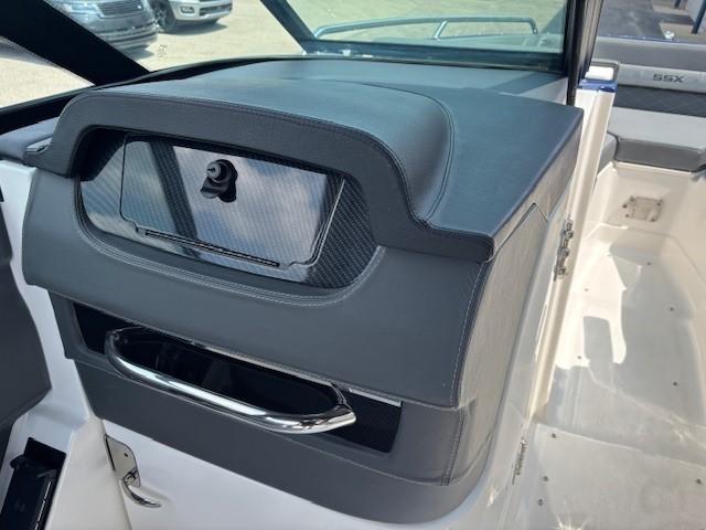 2026 Chaparral SSX 6 boat interior with sleek dashboard and storage compartment.