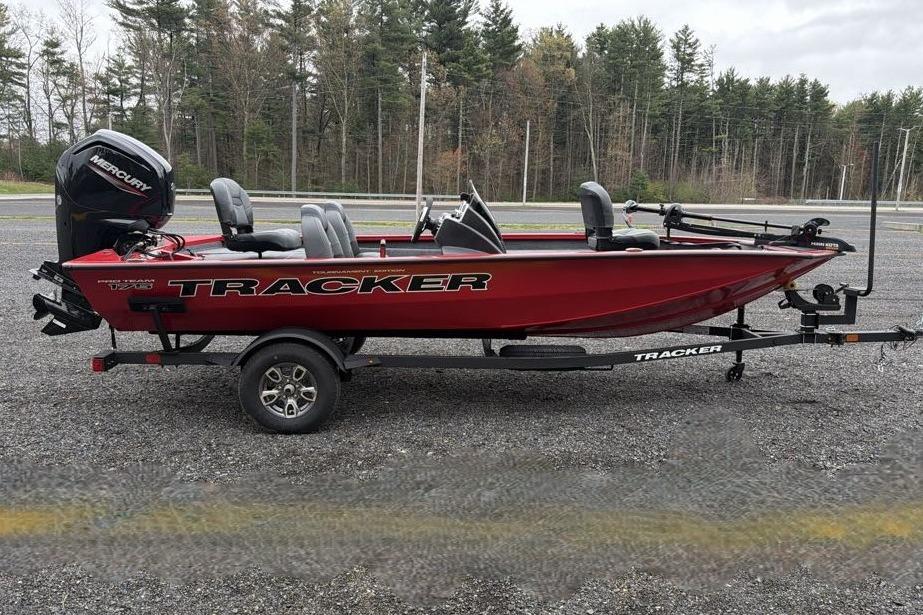 2026 Tracker Pro Team 175 boat on trailer, parked outdoors.