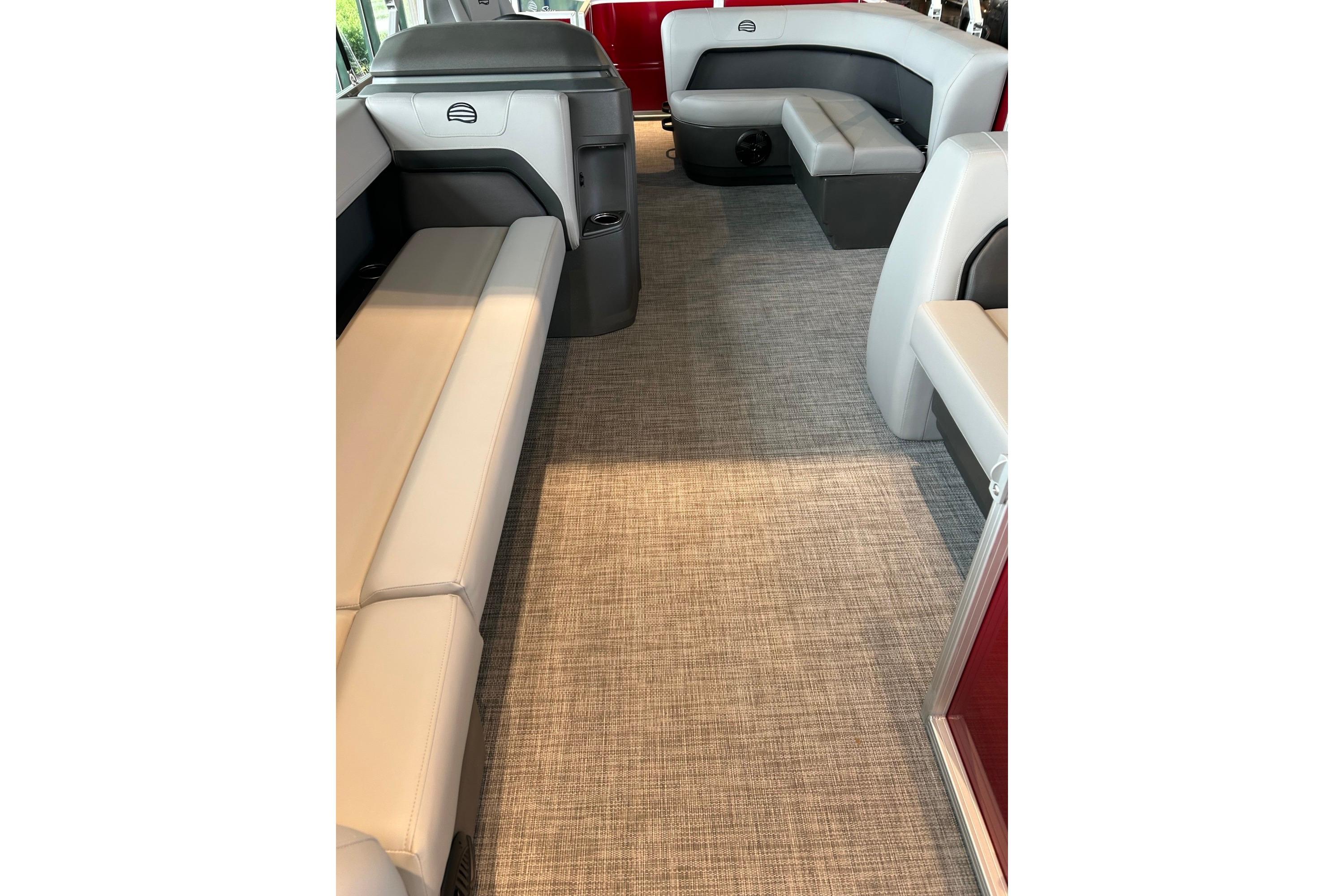 2026 Sun Tracker Party Barge 18 DLX interior with spacious seating and modern design.