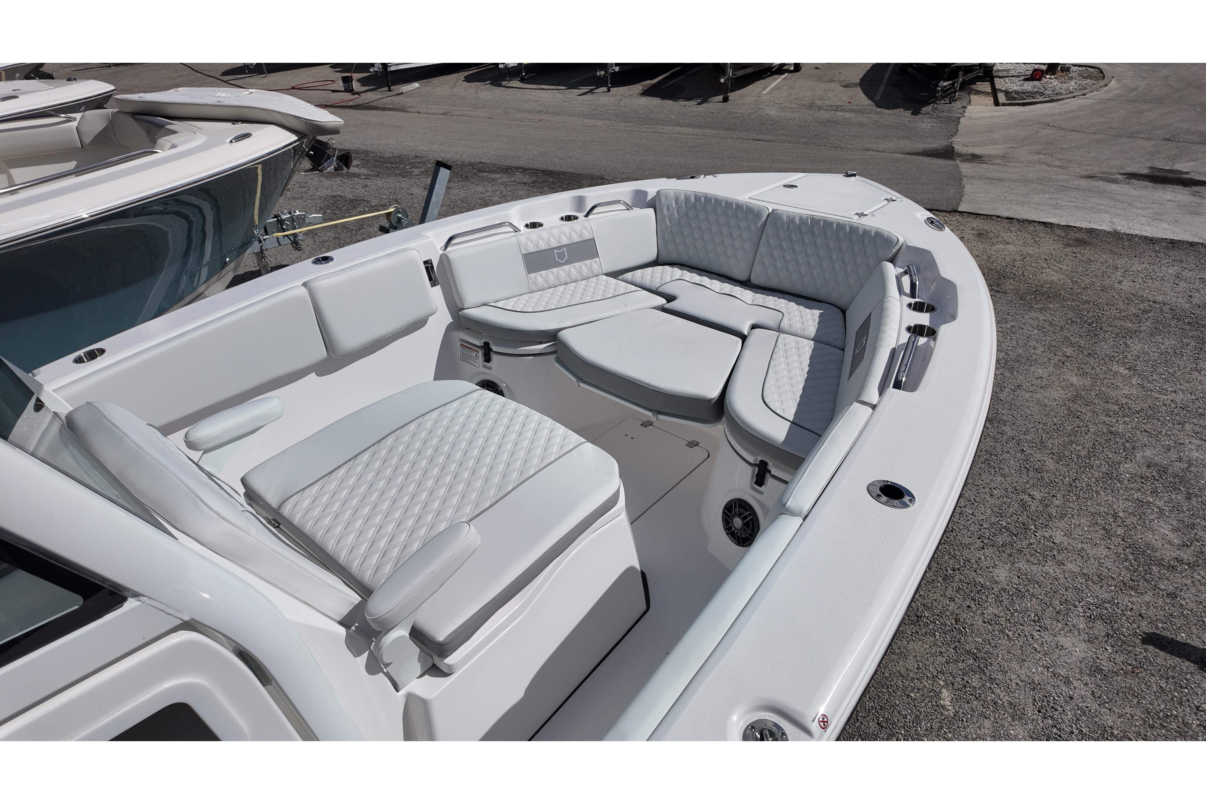 2026 Sea Fox 268 Commander boat interior with cushioned seating and modern design.