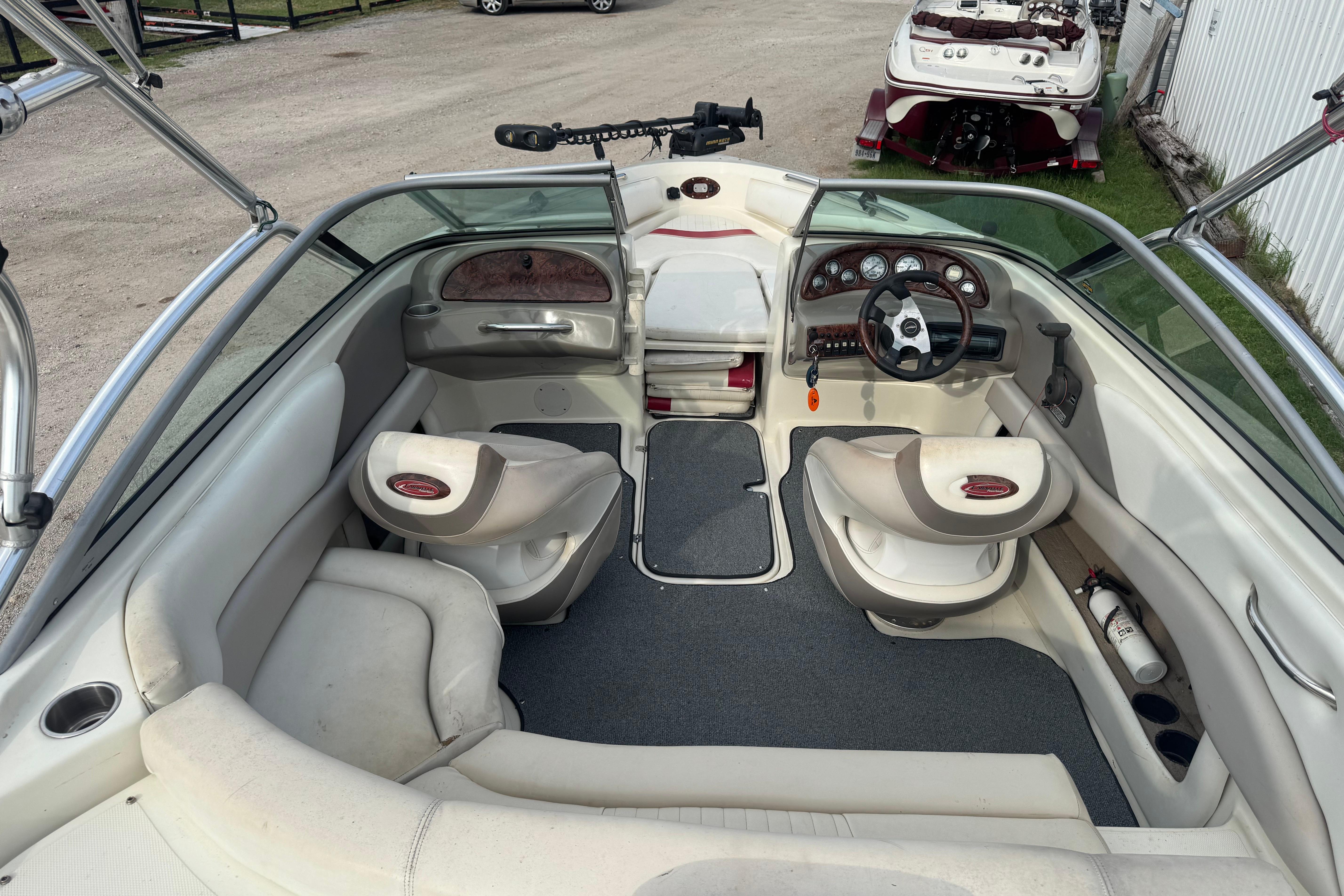 2006 Caravelle 207LS Bow Rider interior with steering wheel, seating, and dashboard.