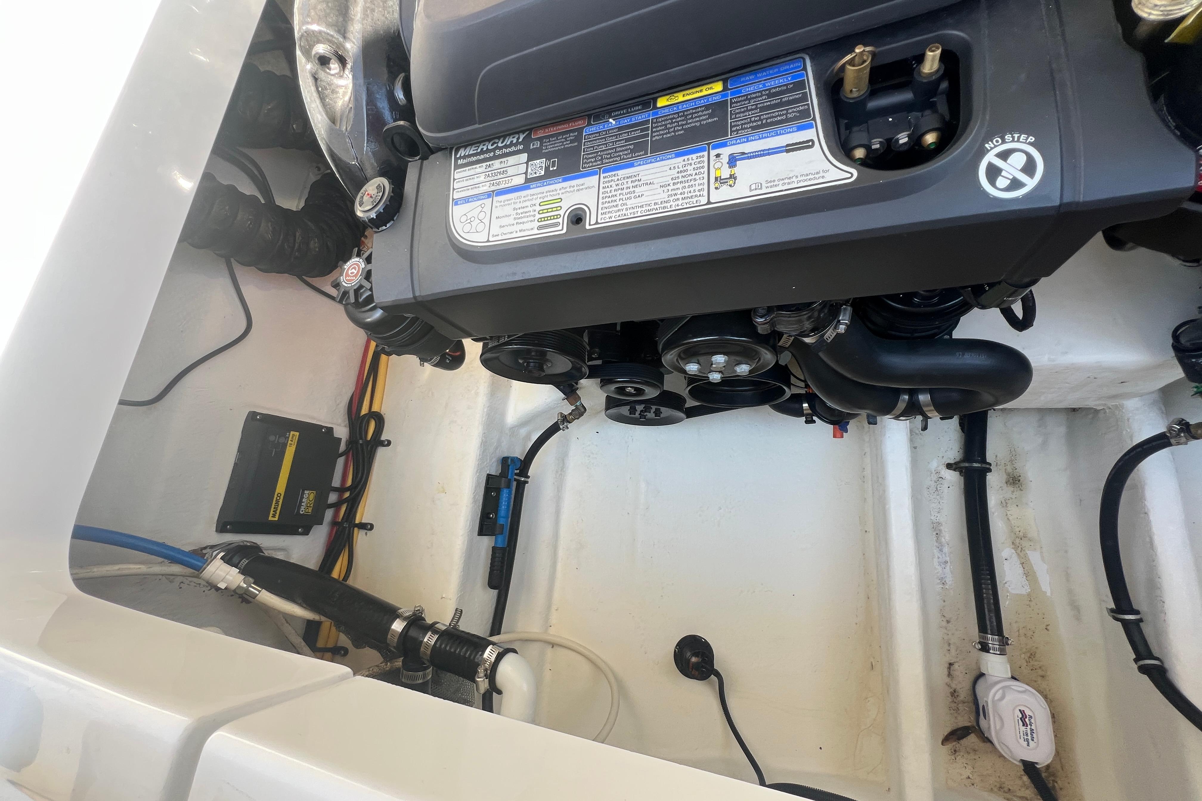 Engine compartment of a 2017 Monterey 298SS Super Sport boat, showcasing mechanical components.