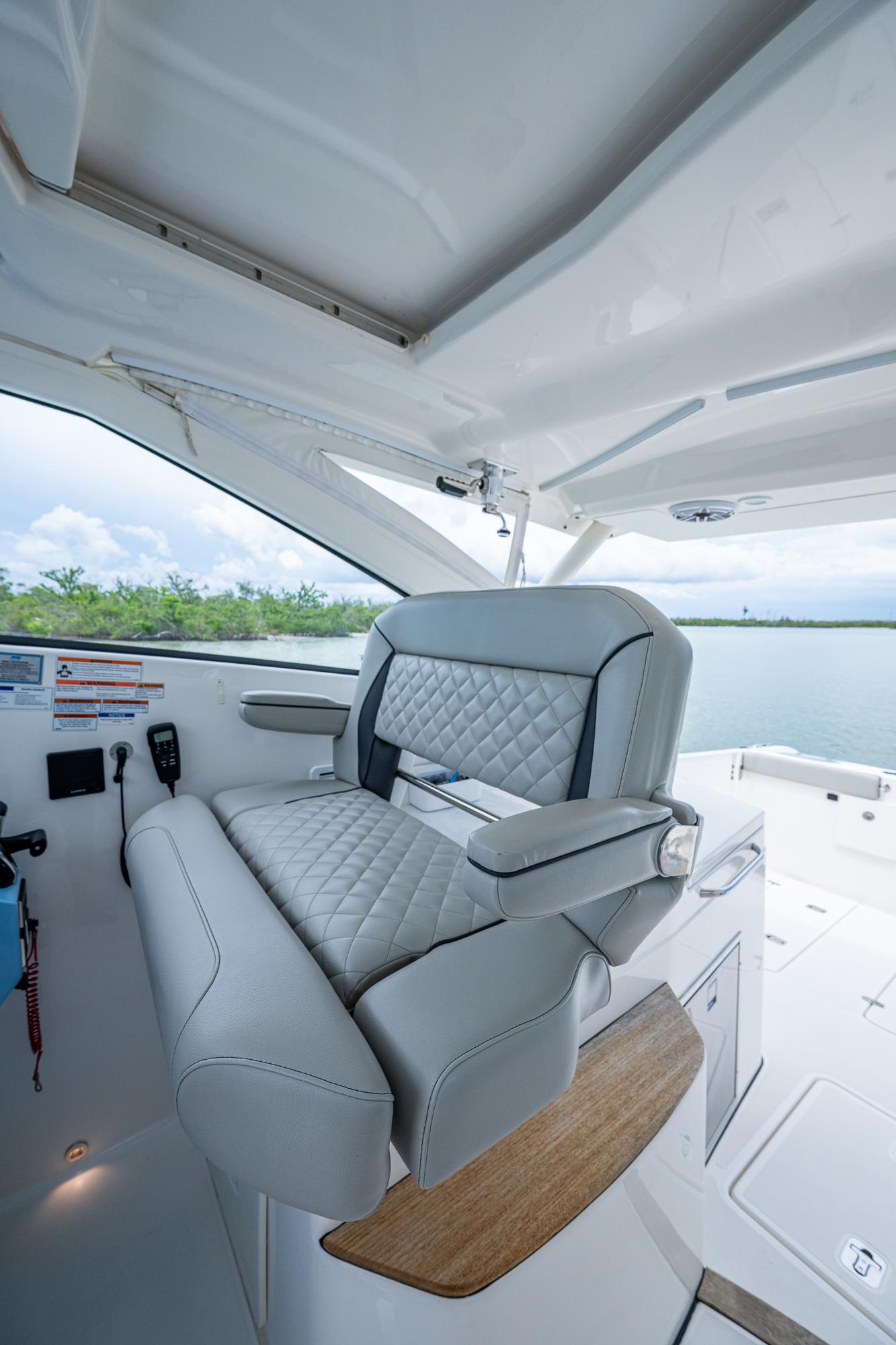 2023 Pursuit DC 365 Dual Console boat interior with luxurious seating and modern design.