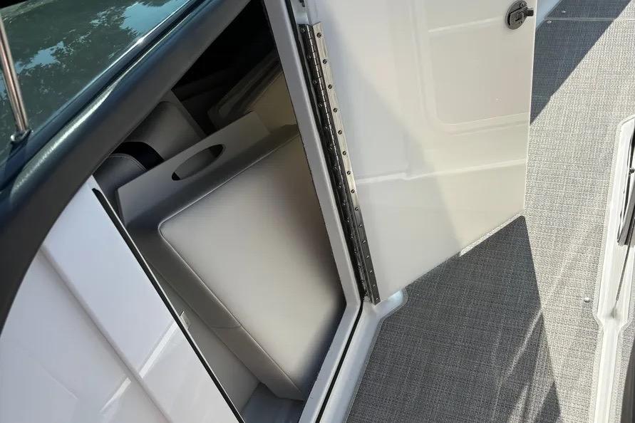 2015 Formula 350 Crossover Bowrider cabin door open, revealing interior storage space.