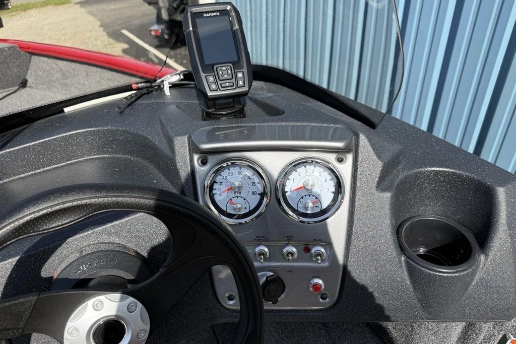 Dashboard of 2026 Tracker Pro Guide V-16 SC boat with Garmin GPS and gauges.