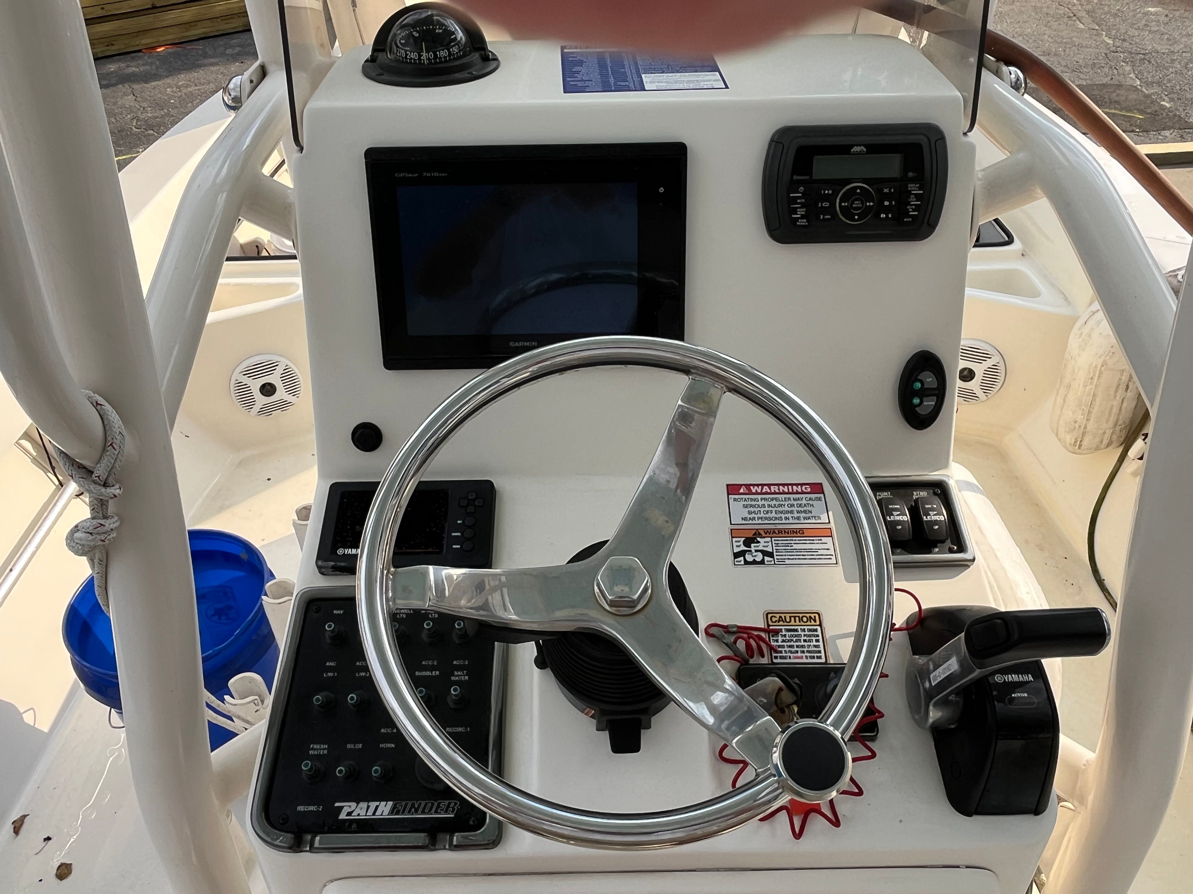 Steering console of a 2016 Pathfinder 2400 TRS boat.