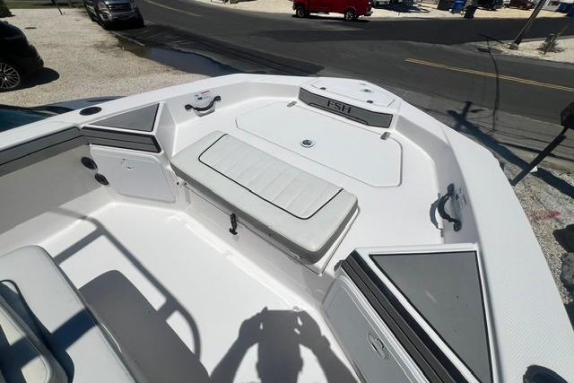 2019 Yamaha Boats 190 FSH Sport interior, featuring spacious seating and storage compartments.