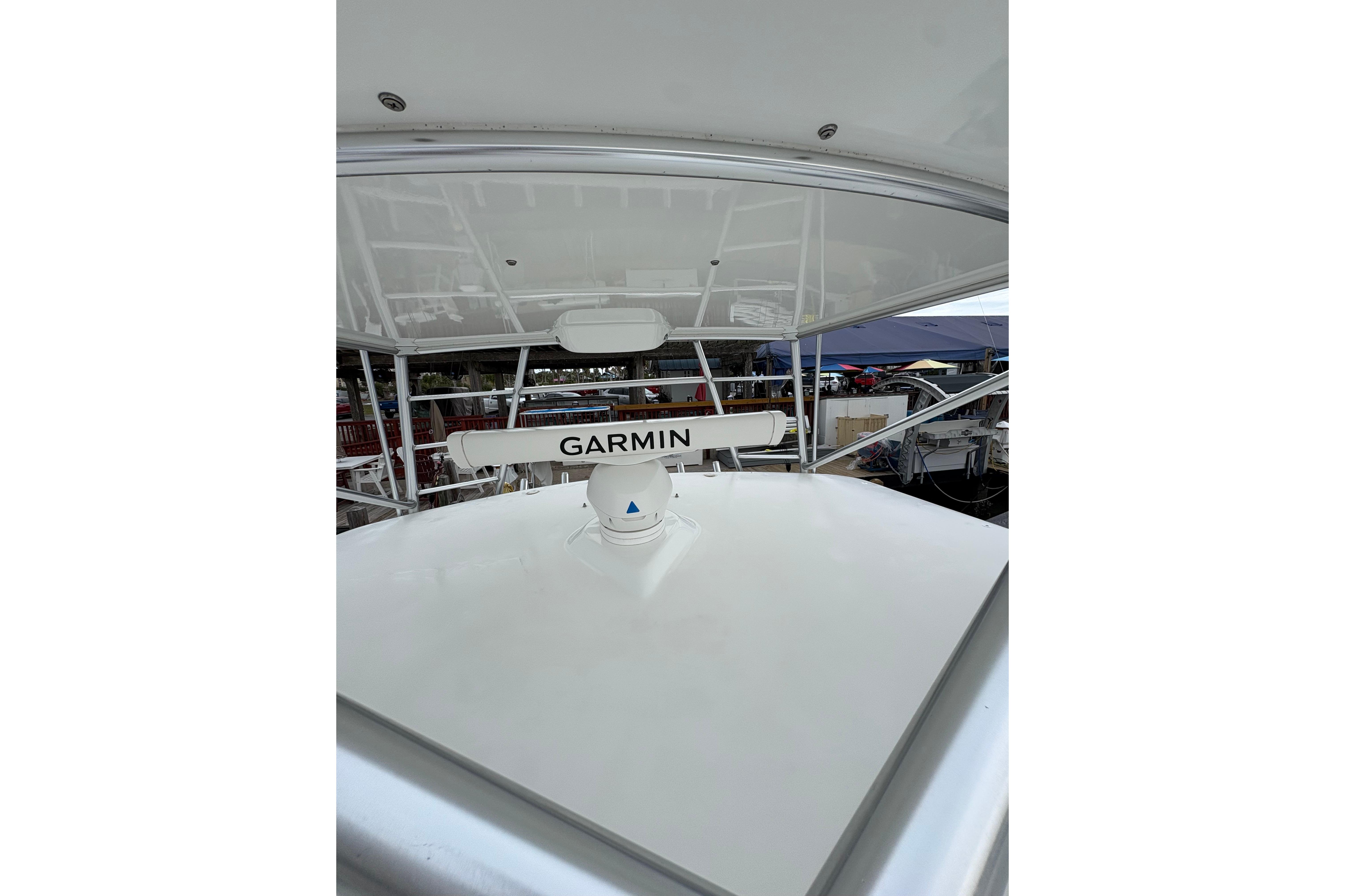 2004 Cabo 40 Hardtop Express boat with Garmin radar system on deck.