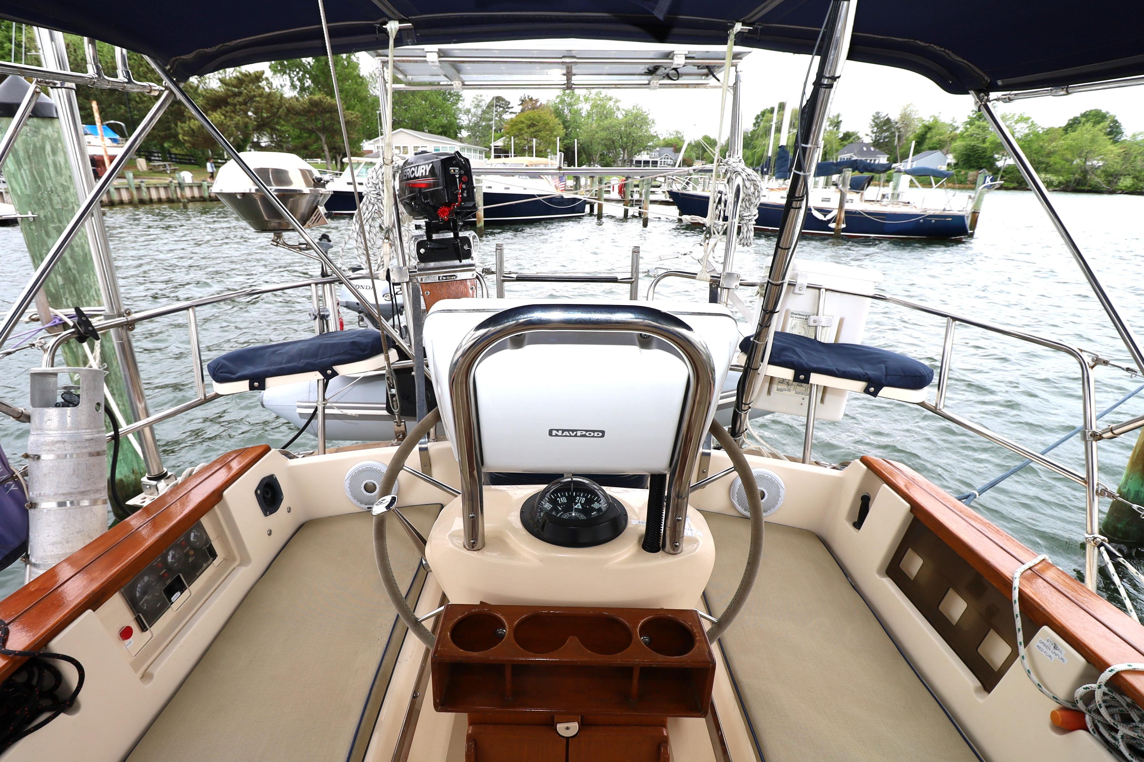 Cockpit view of 2001 Island Packet 380 sailboat docked at marina.