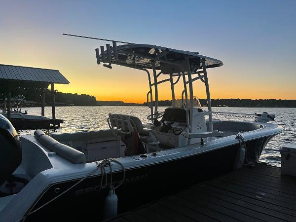 2020 Sportsman Heritage 231 Center Console boat docked at sunset.