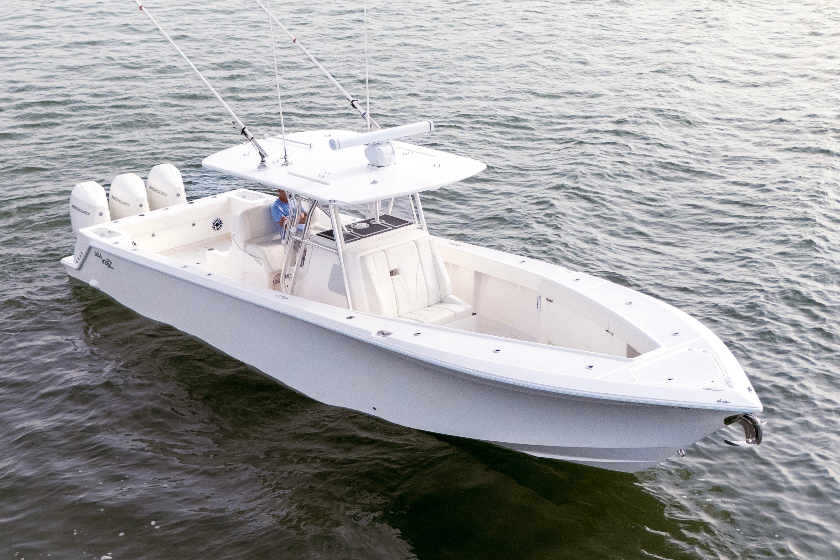 2022 SeaVee 370Z boat on water, featuring triple outboard engines.