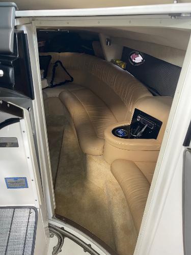 Interior of a 2005 Cobalt 343 boat with beige seating and modern amenities.