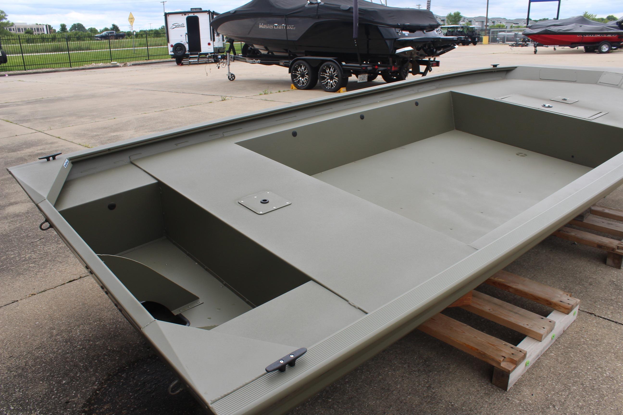 2026 Tracker Grizzly 1754 Utility boat on display, showcasing spacious interior and durable design.