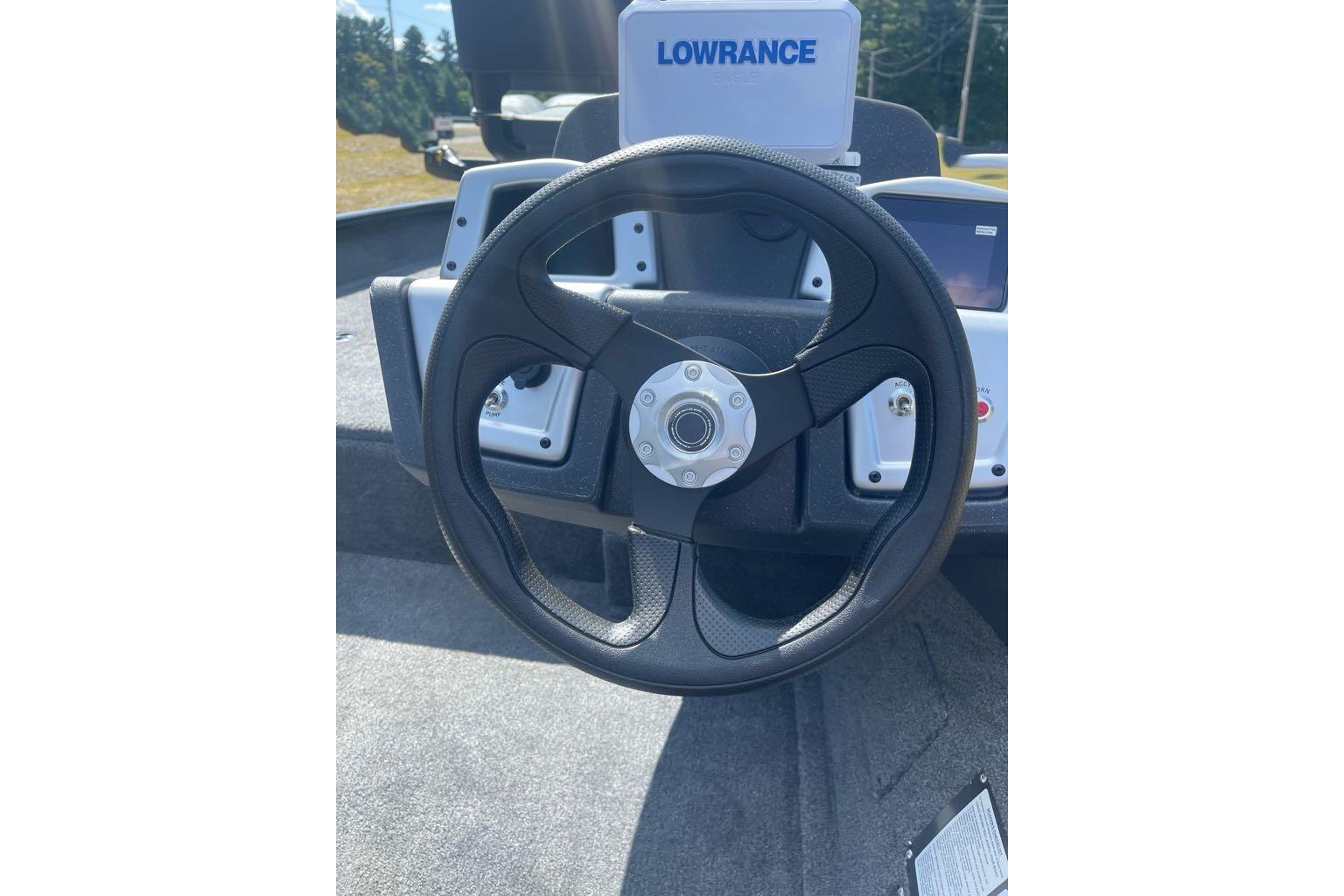 Steering wheel of 2026 Tracker Pro Team 175 Crappie Edition boat with Lowrance system.