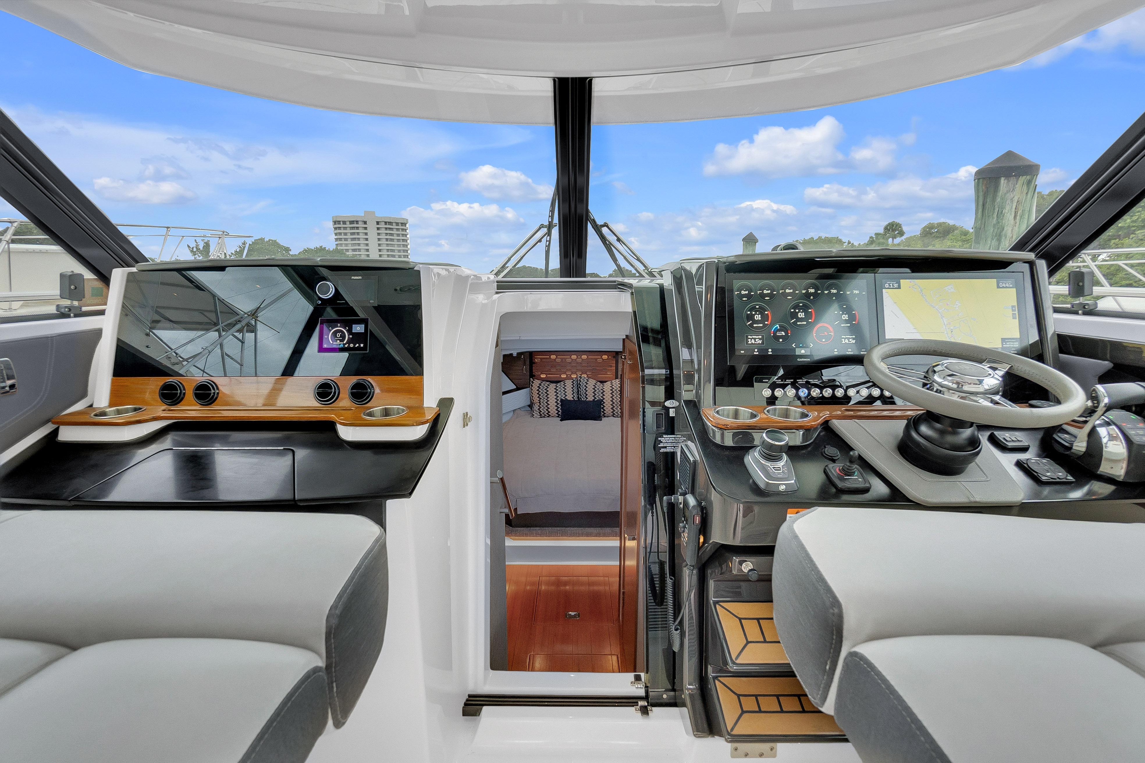 2021 Tiara Sport 43 LE helm with advanced navigation and control systems.