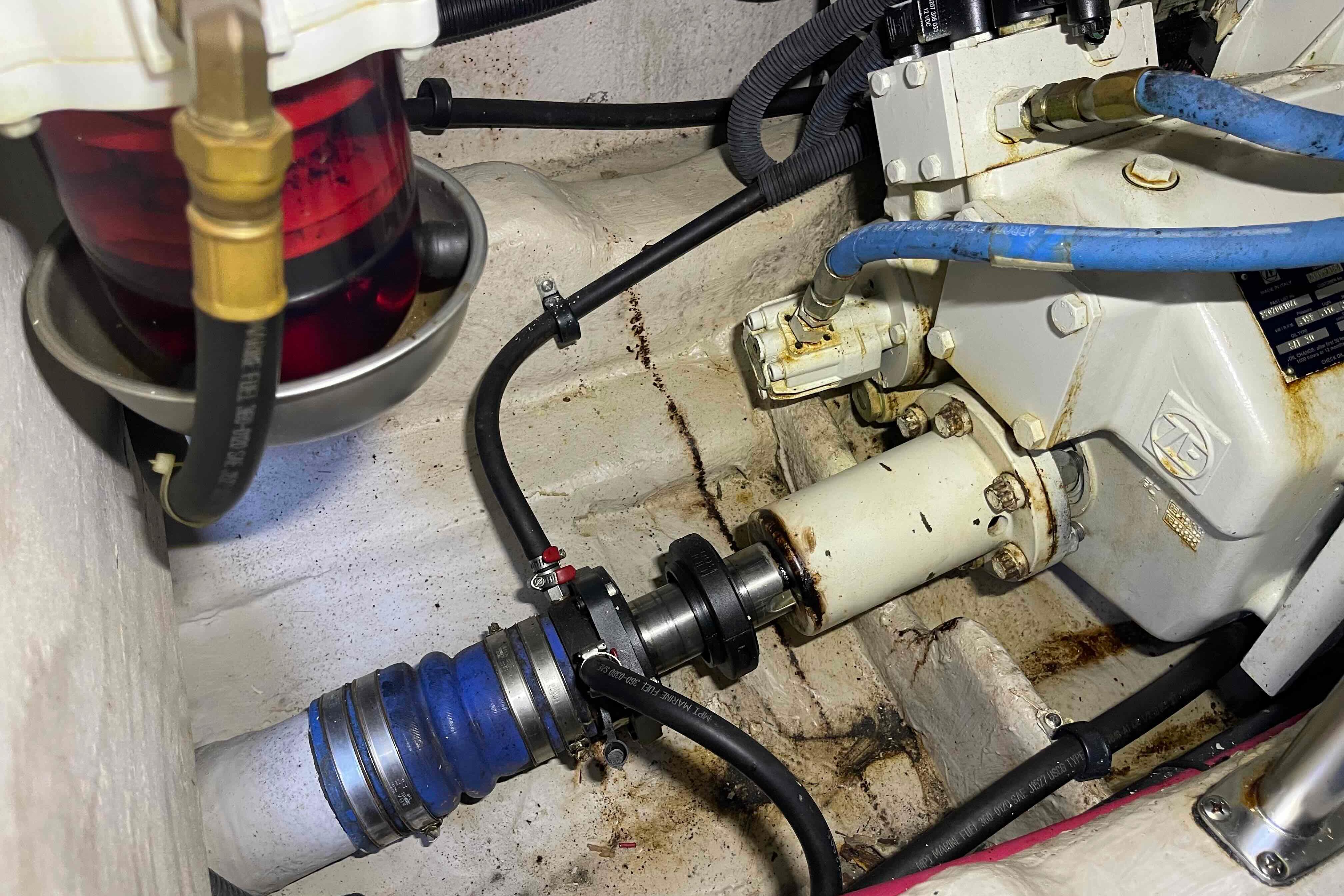 Engine compartment of 2005 Sea Ray 420 Sedan Bridge with visible mechanical components.
