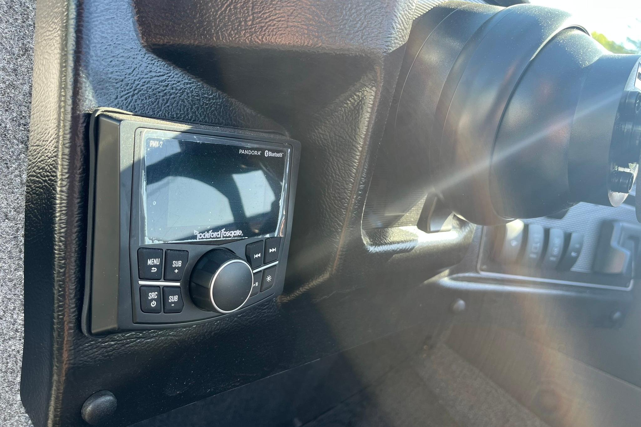Rockford Fosgate audio system in 2026 Lund 2275 Baron boat dashboard.