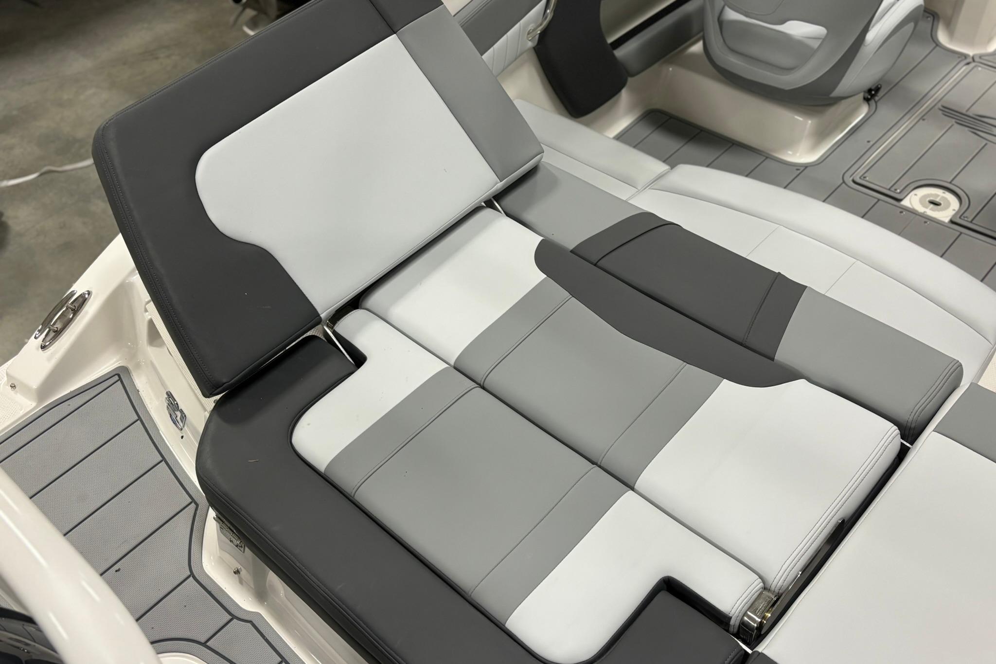 2026 Chaparral 21 SSi OB boat interior with gray and white seating.
