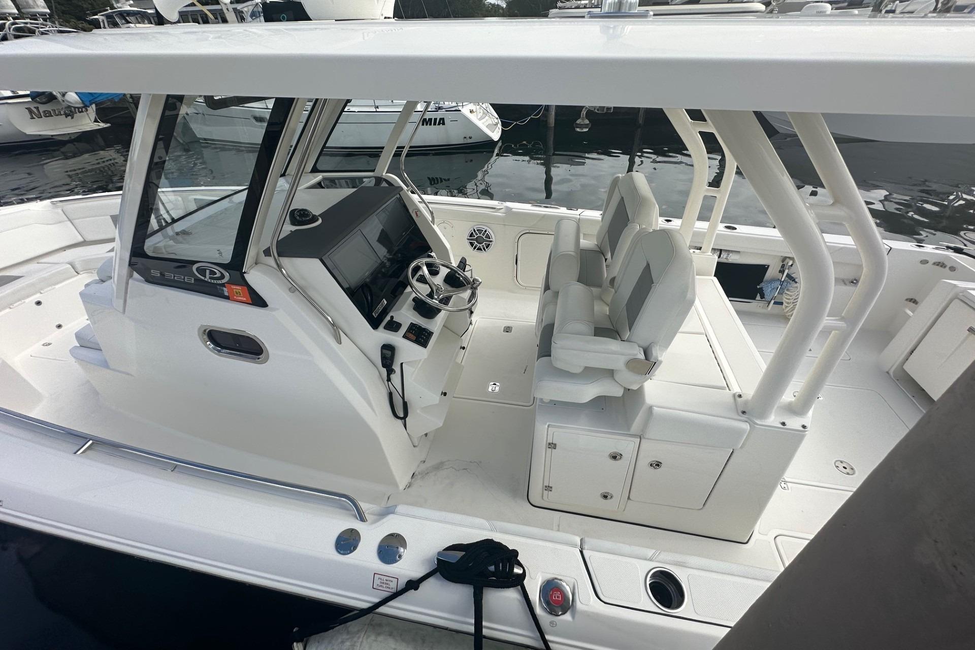 2023 Pursuit S 328 Sport boat interior with helm and seating area.