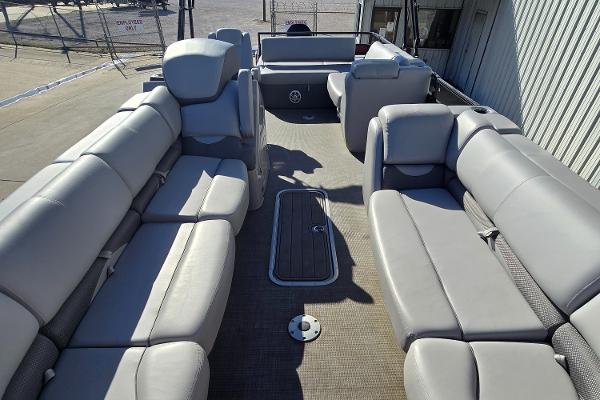2023 Regency 250 DL3 pontoon boat interior with spacious seating and modern design.