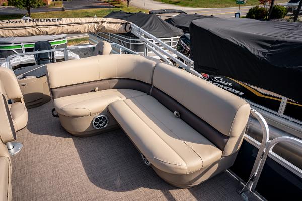2025 Sun Tracker BASS BUGGY 18 pontoon boat with beige seating and spacious deck.