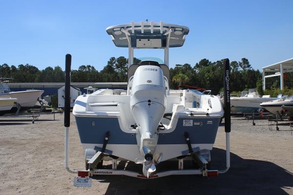 2023 Sea Pro 239 Center Console boat, rear view, parked on a trailer.