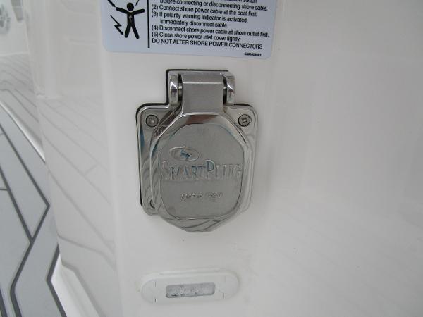 SmartPlug outlet on 2025 Solara S-250 CW boat, featuring safety instructions.