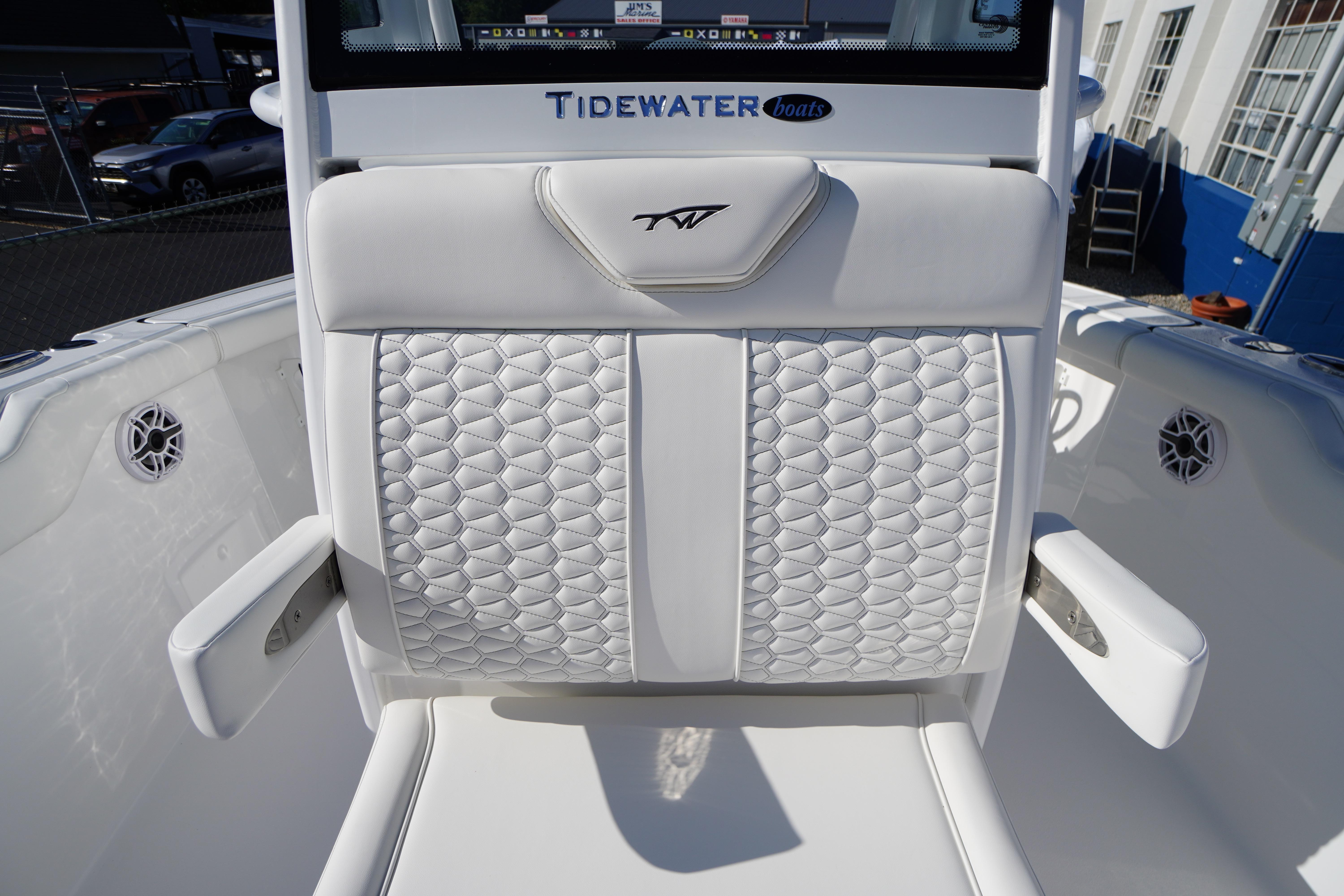 2026 Tidewater 272 LXF boat with luxurious white quilted seating.
