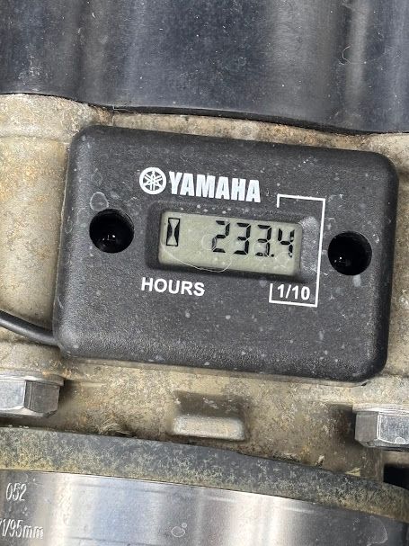 Hour meter on a Yamaha boat displays 233.4 hours.