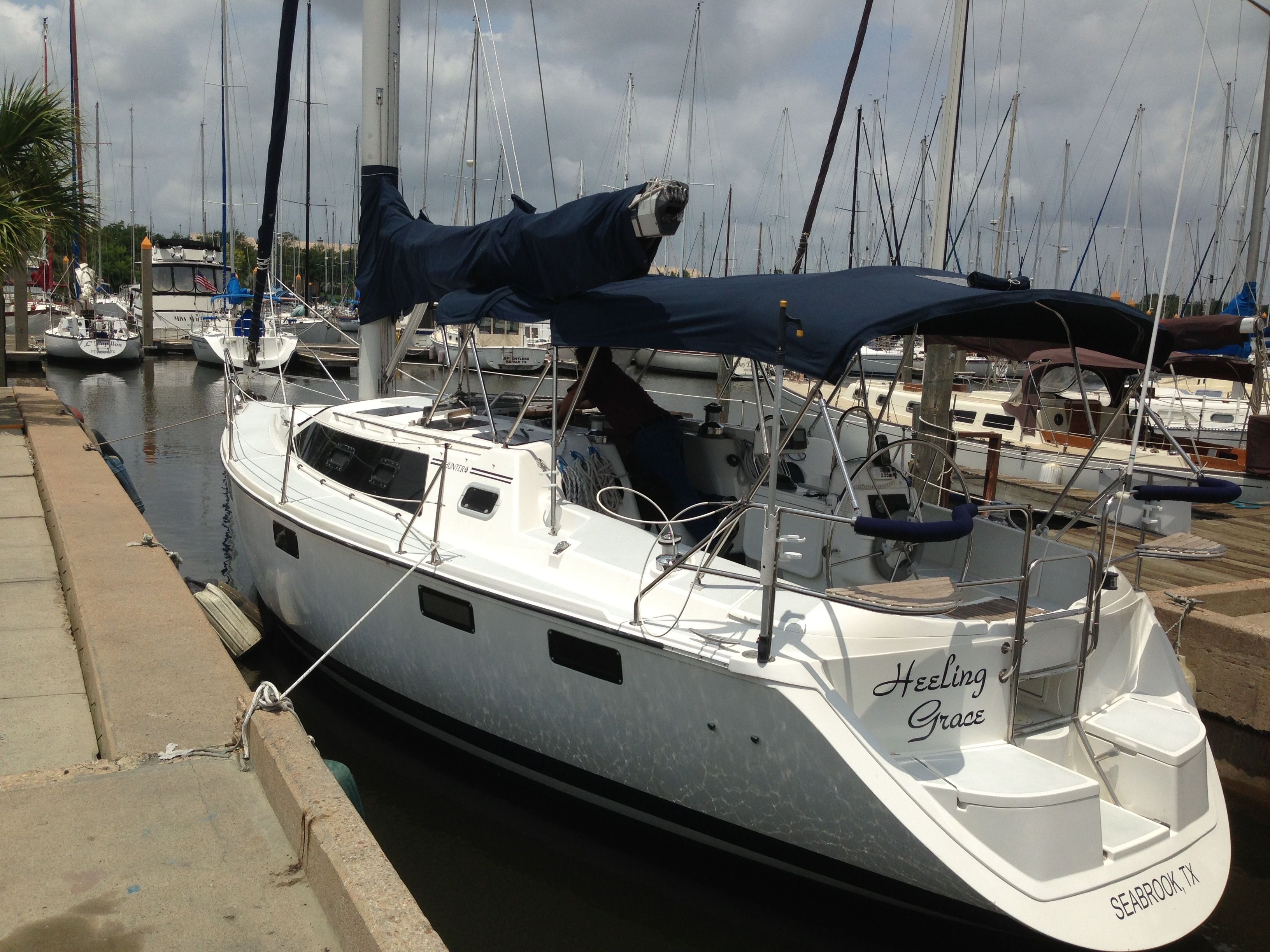 Hunter 36 Vision 1995 sailboat docked in marina.