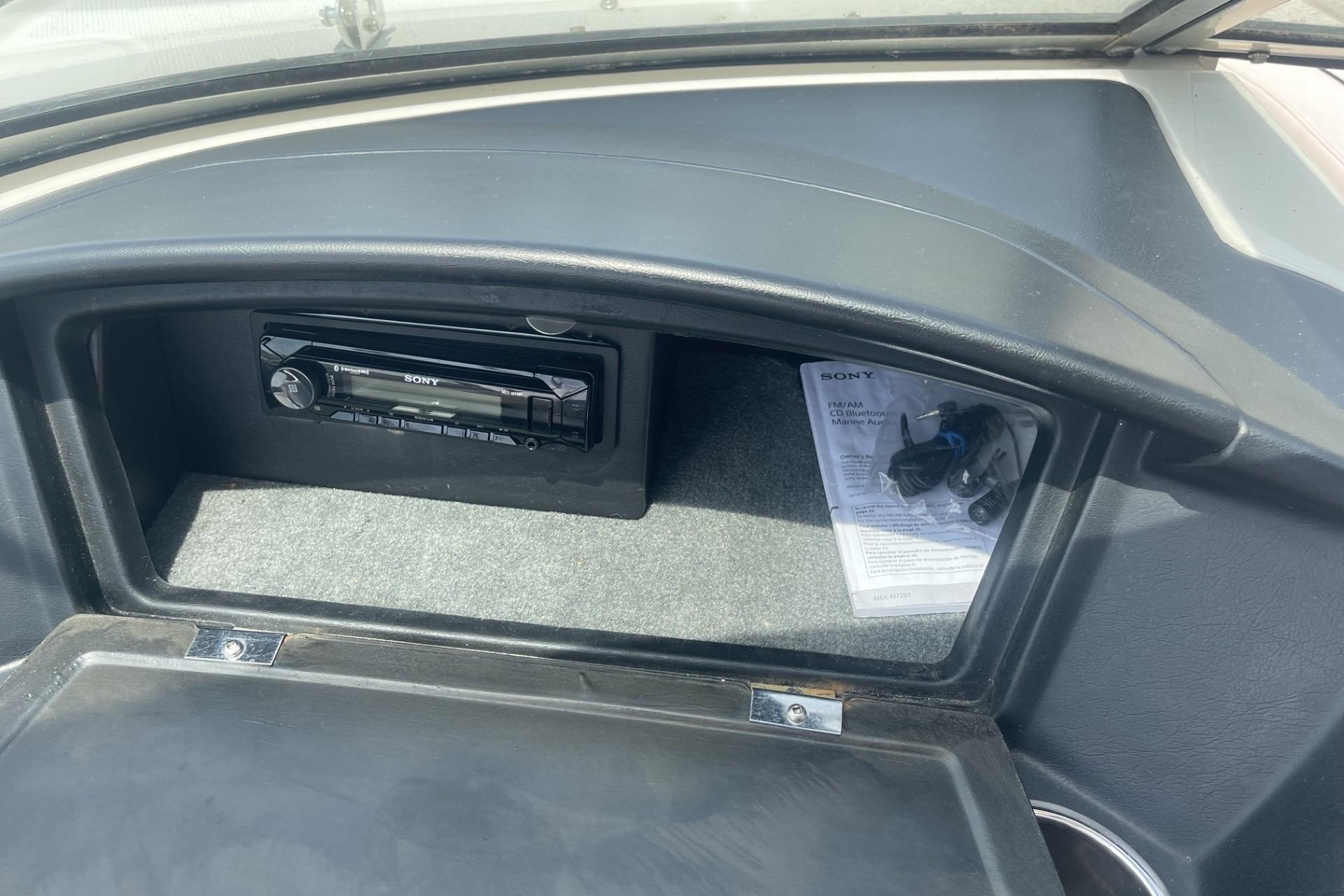 2010 Sea Ray 230 Bow Rider Select dashboard with Sony stereo system.
