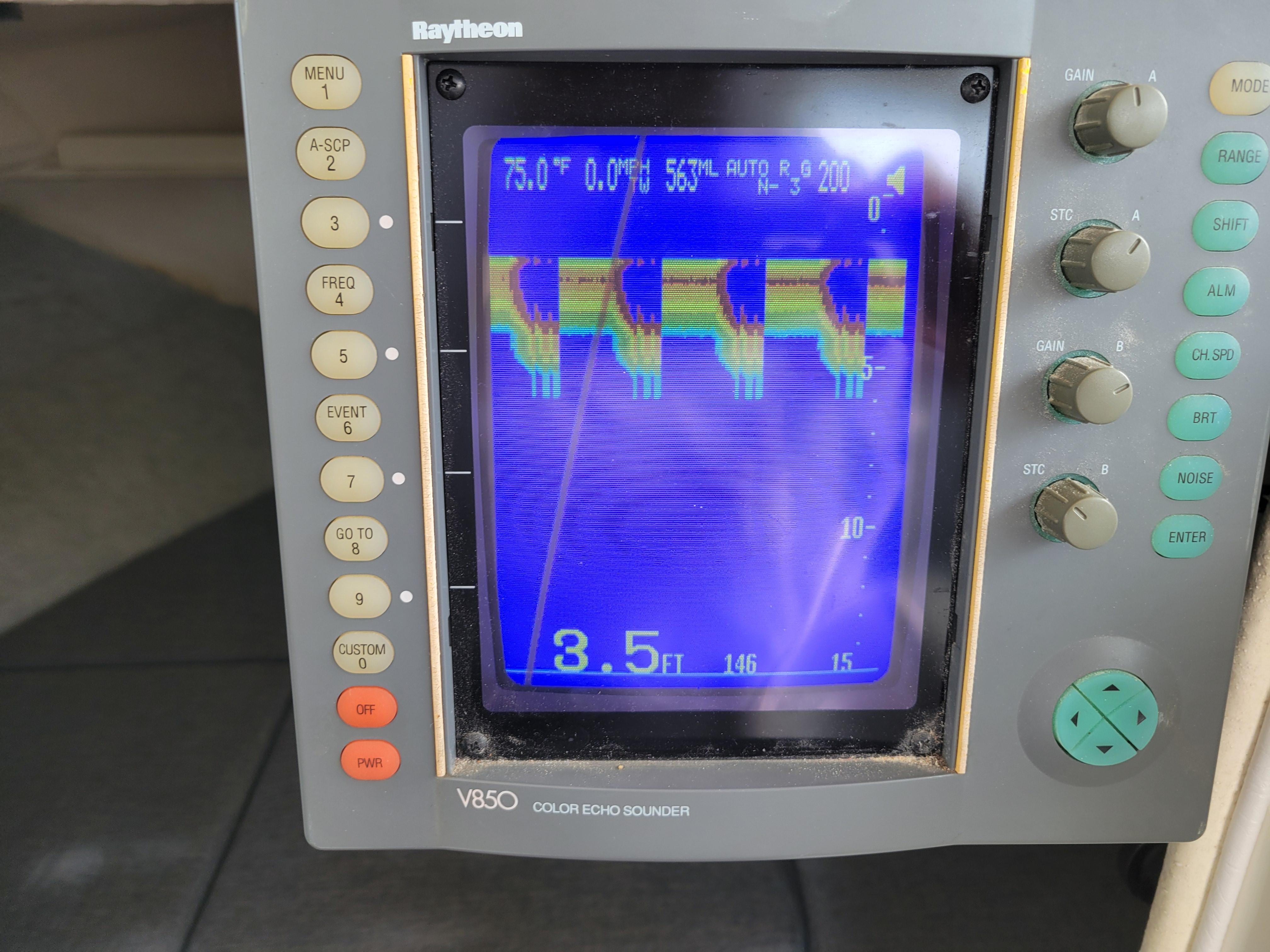 Raytheon V850 color echo sounder display on 1999 SeaSport 2400 XL Limited boat.