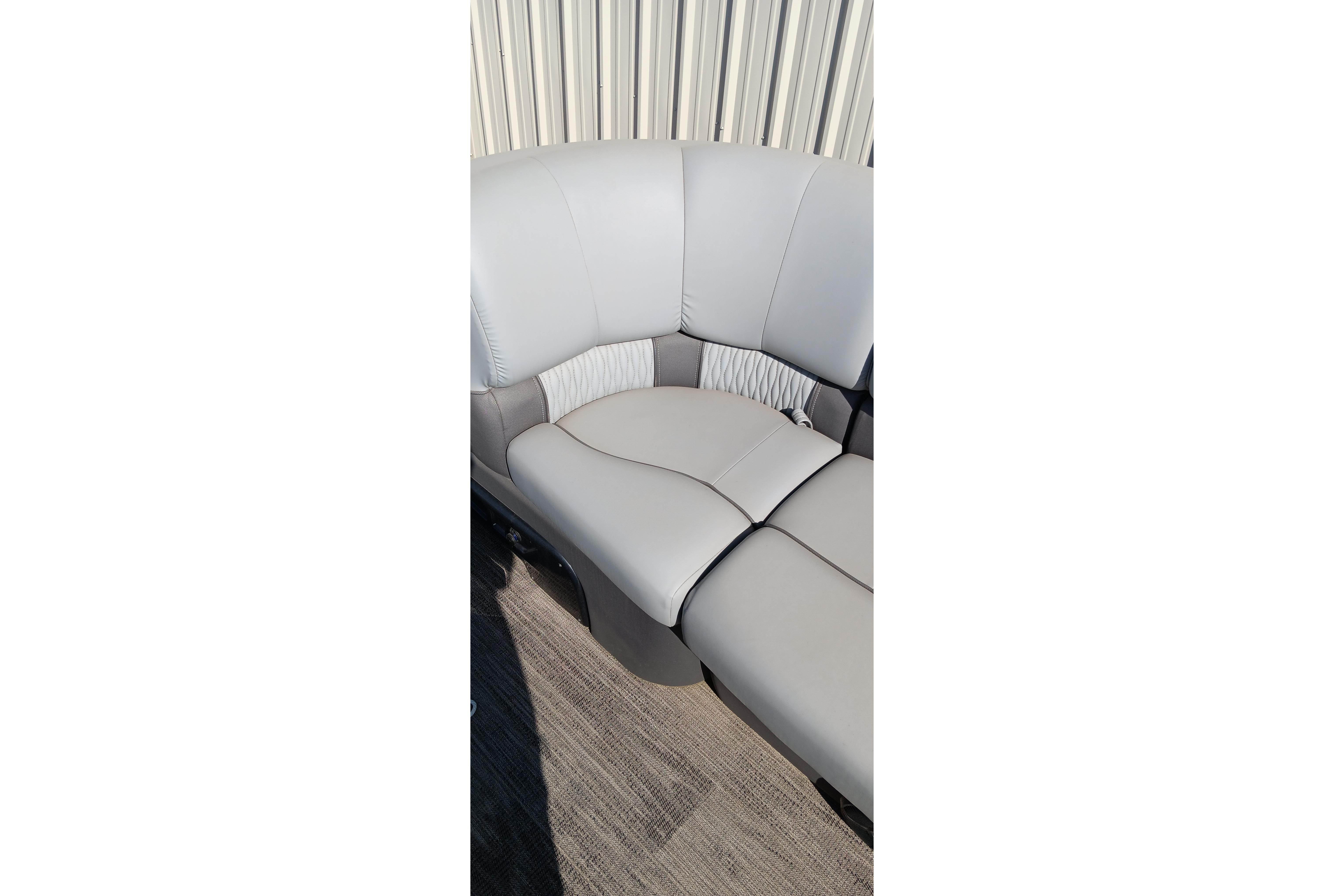 2023 Ranger 2500LS boat interior with gray cushioned seating.