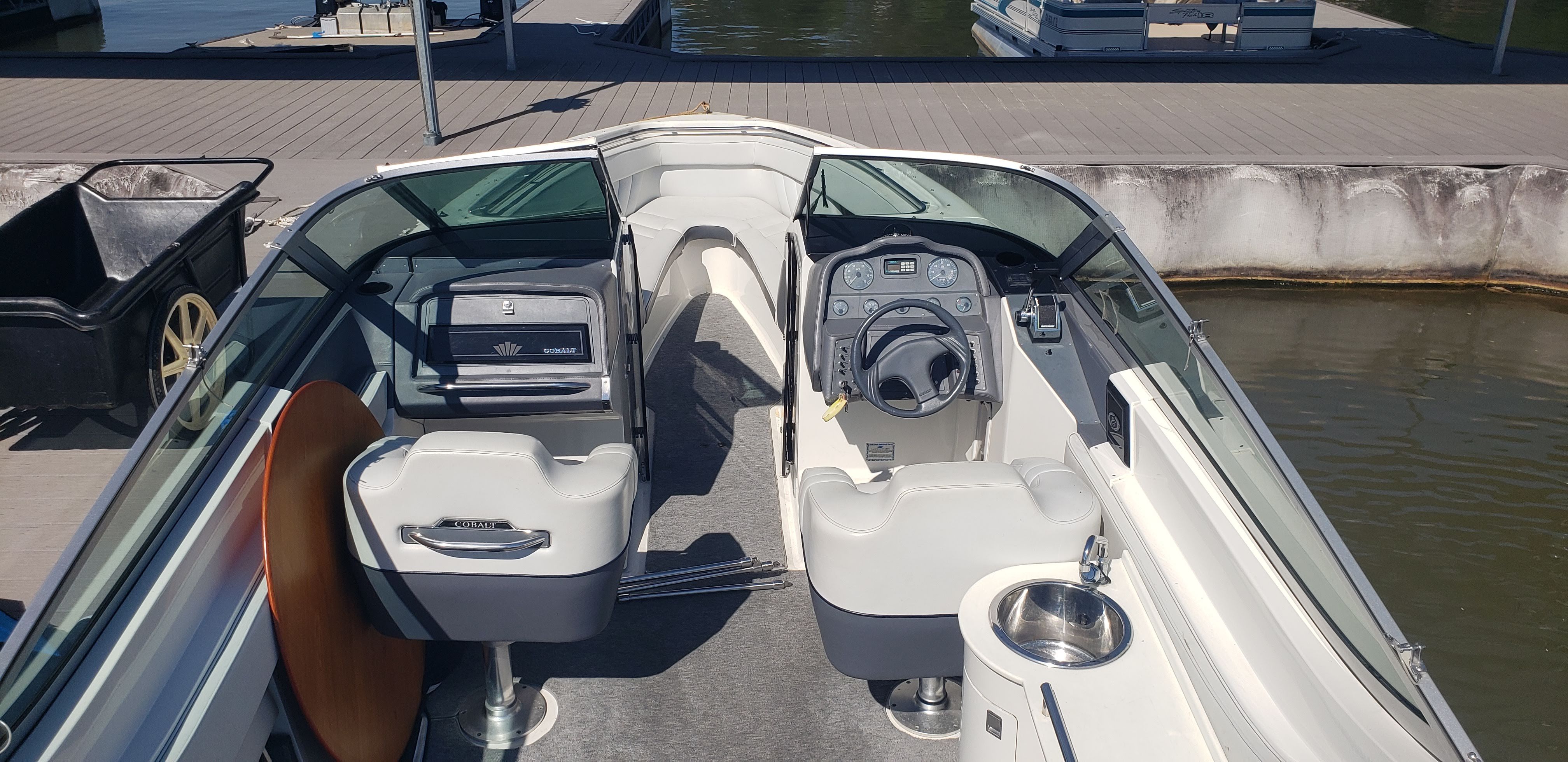 Interior of a 1993 Cobalt 272 boat at the dock.