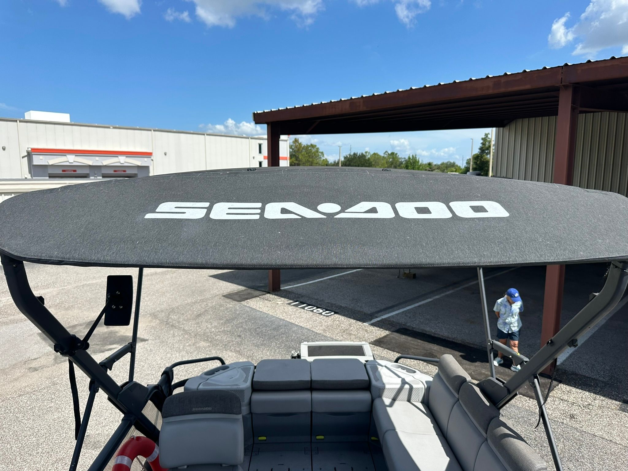 Sea-Doo 21 SWITCH SPORT 2023 with sunshade at the dock.