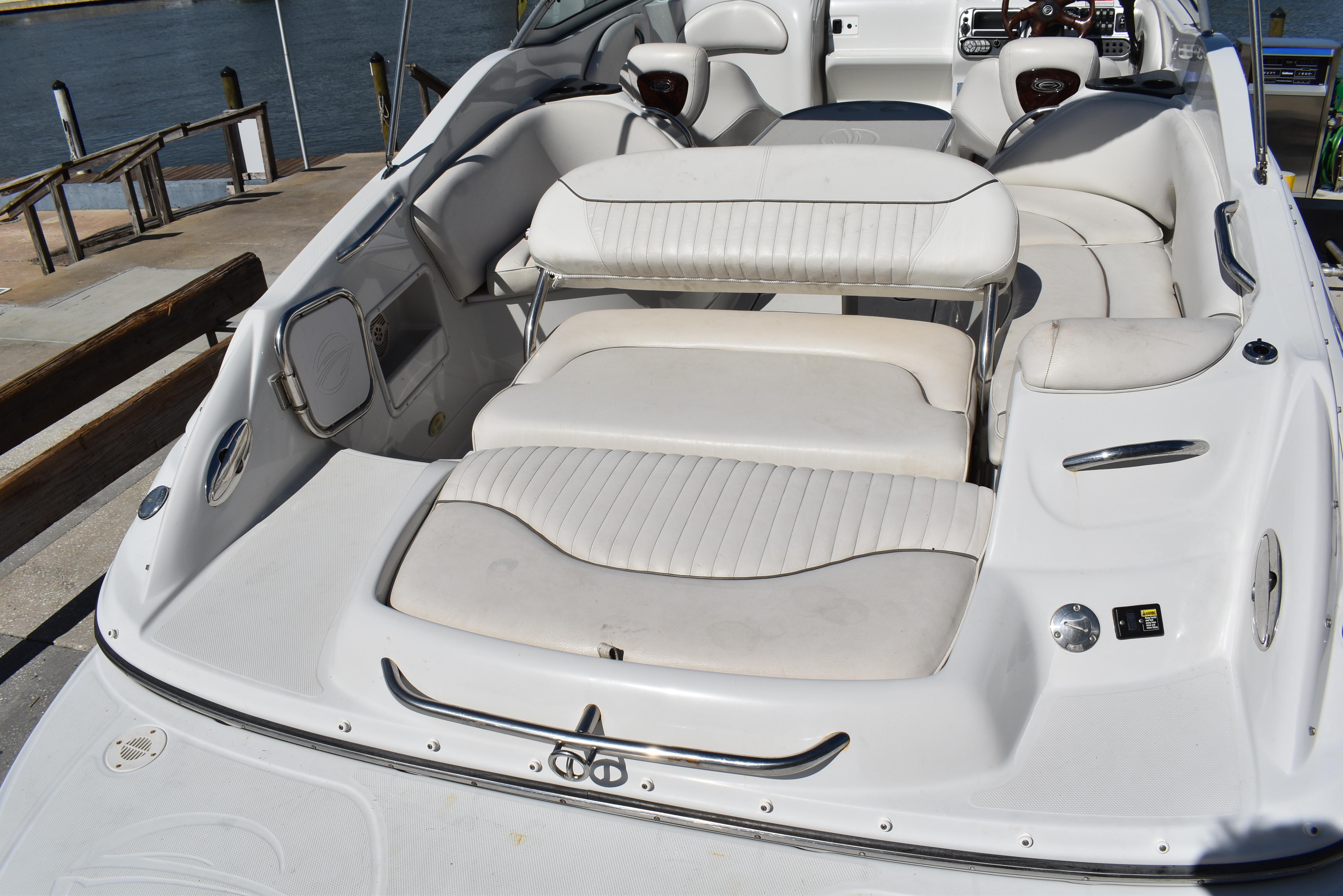 2005 Crownline 275 CCR boat interior with white seating and sleek design.