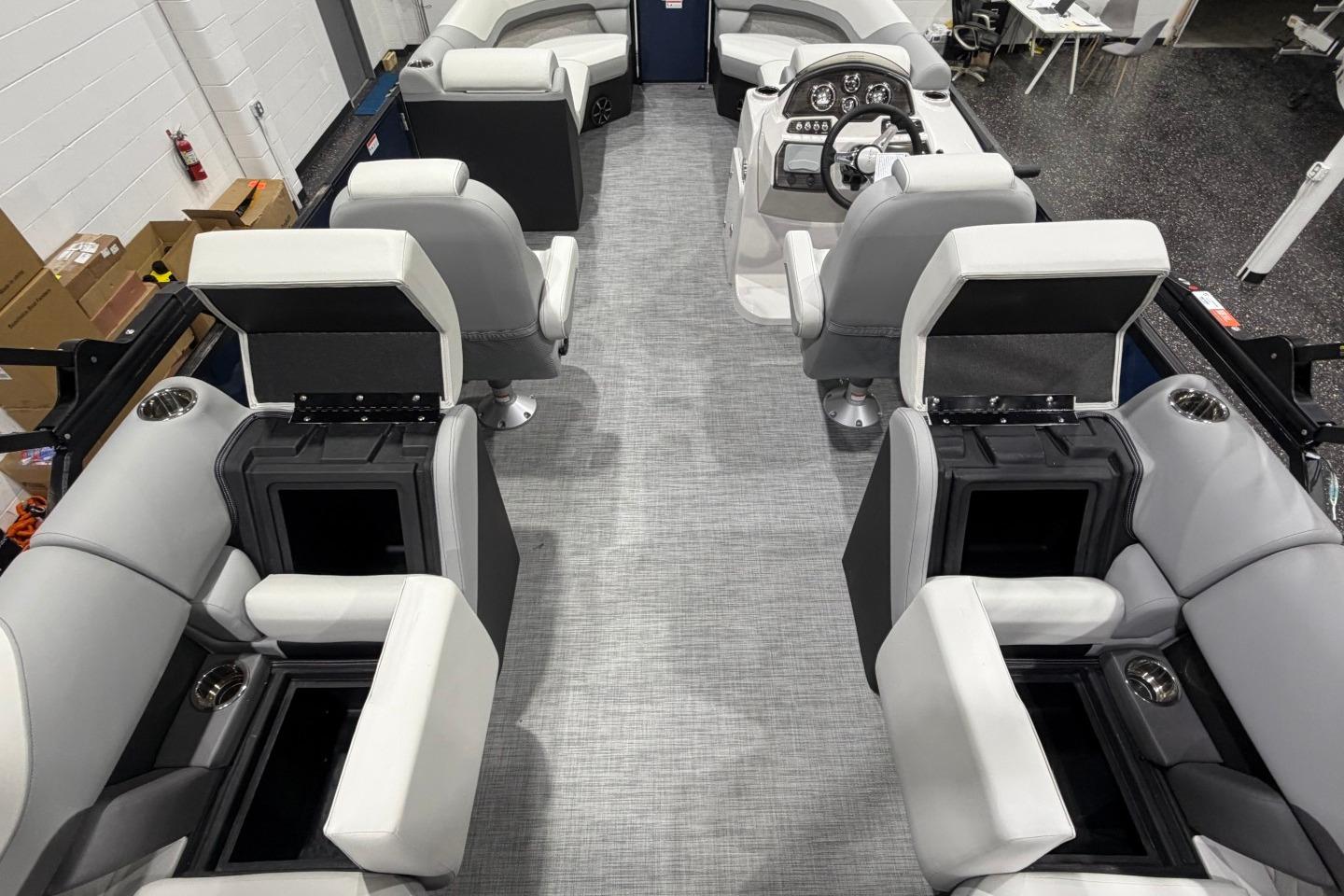 Interior view of 2026 Lowe SS 230 WT pontoon boat with modern seating and helm.