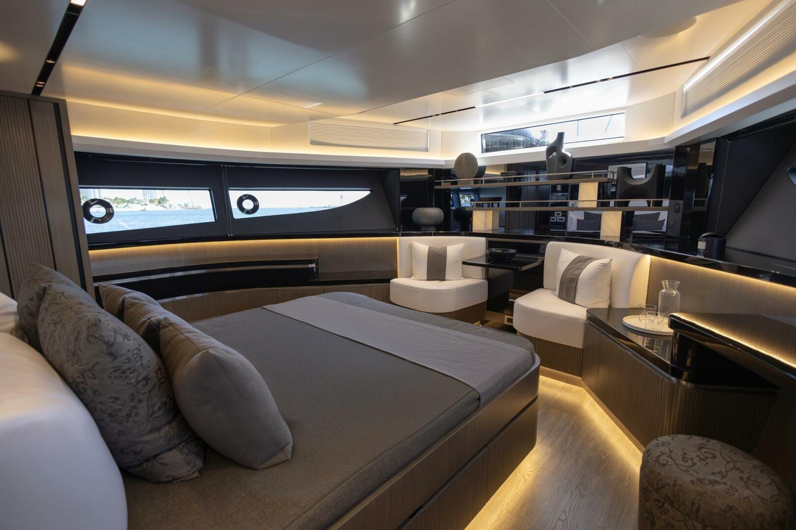 Luxurious interior of 2023 Pearl 72 yacht with modern design and ambient lighting.