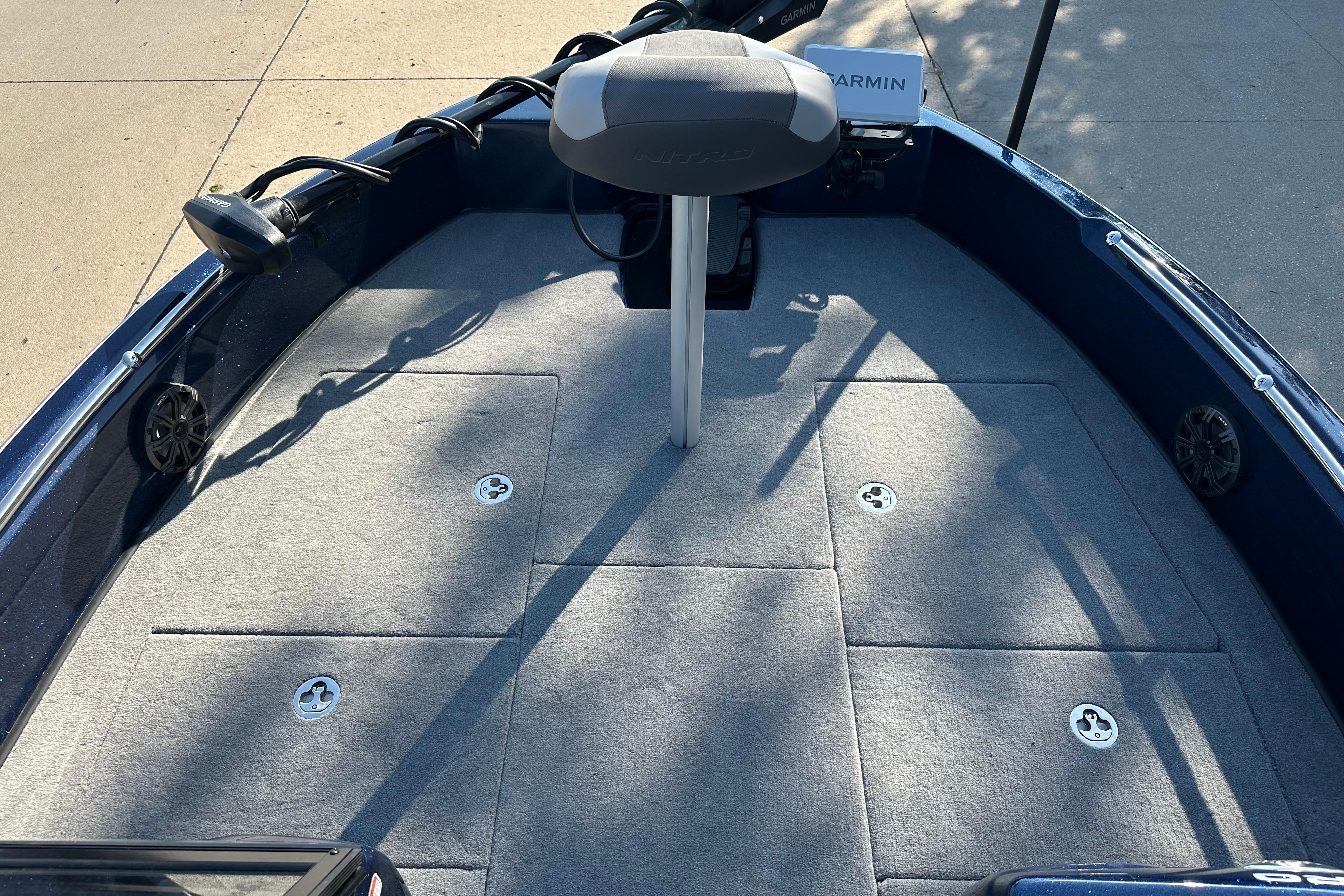 2026 Nitro ZV19 Sport Pro boat deck with Garmin equipment and carpeted flooring.