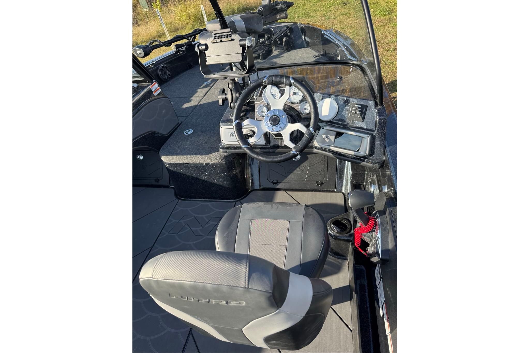 2026 Nitro ZV20 Pro boat interior with steering wheel and dashboard controls.